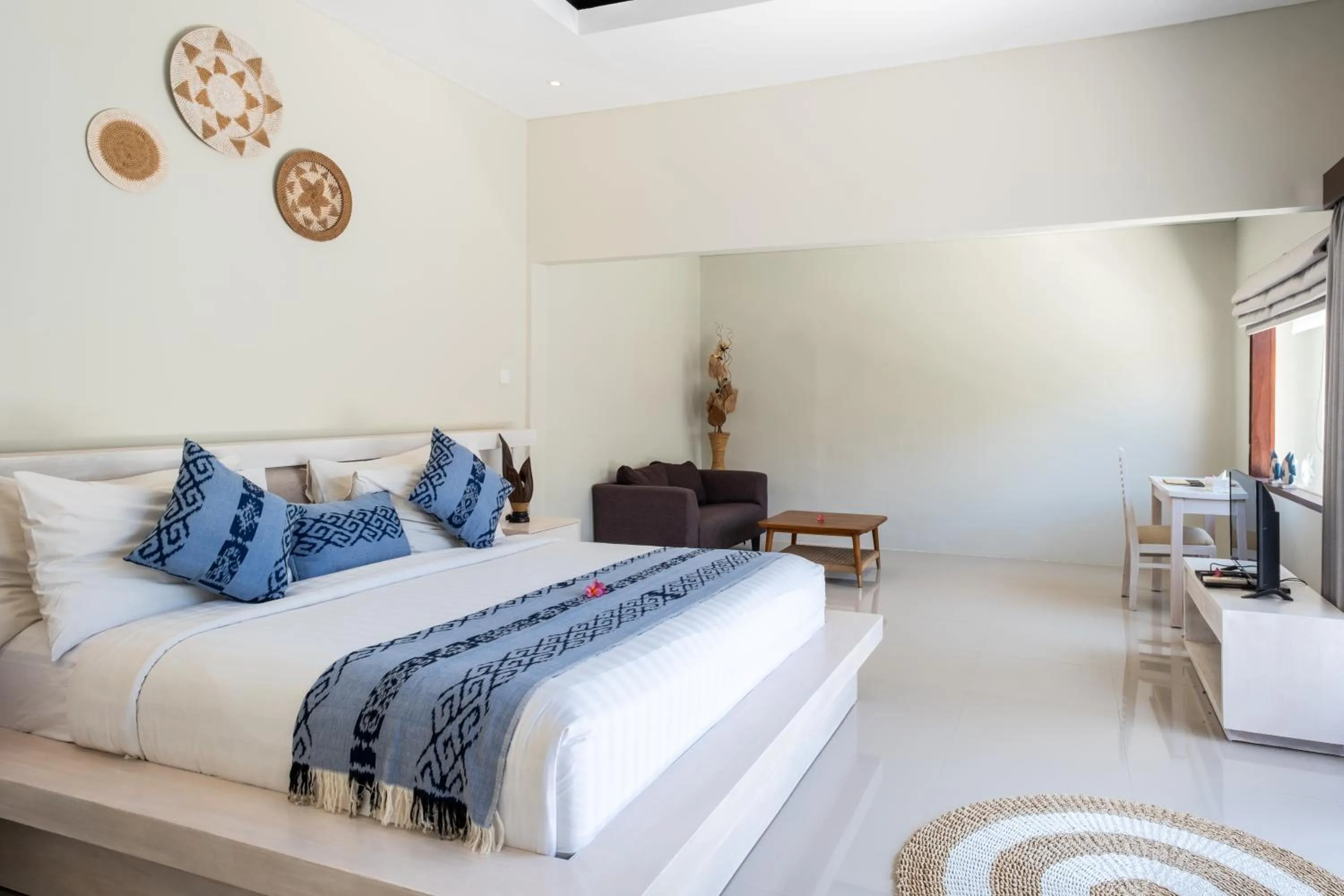 Bed in Living Asia Resort and Spa