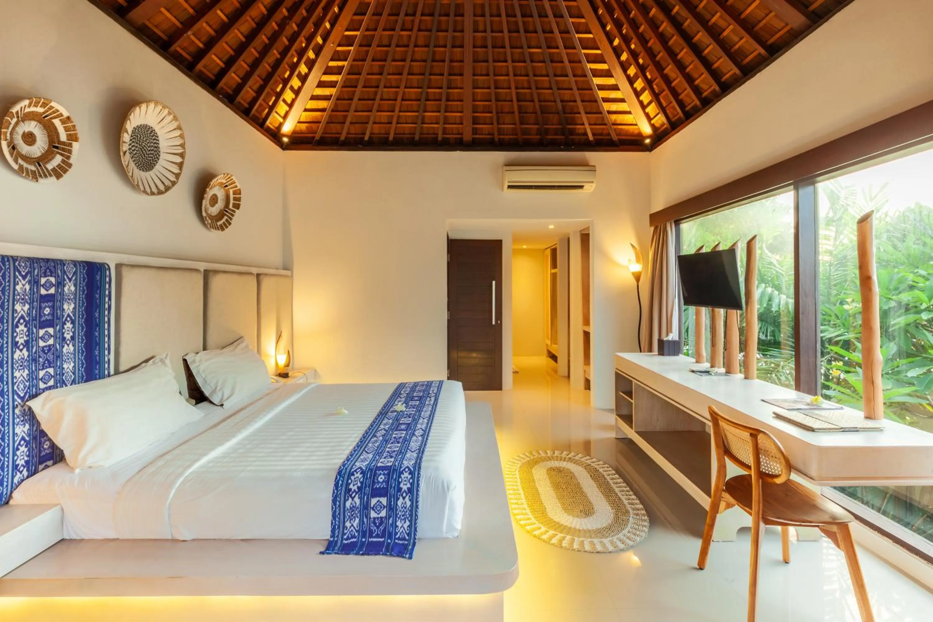 Bed in Living Asia Resort and Spa