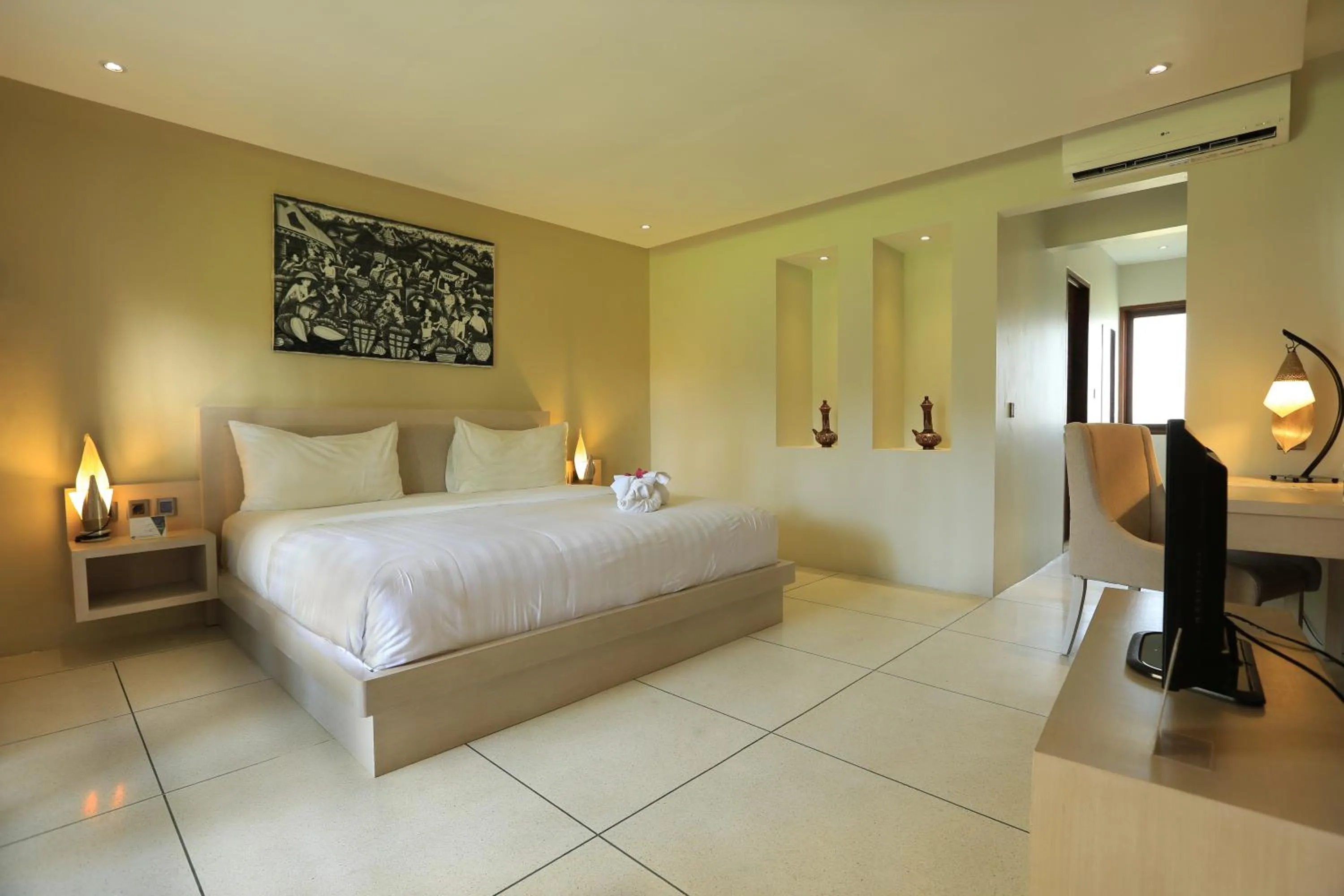 Bed in Living Asia Resort and Spa