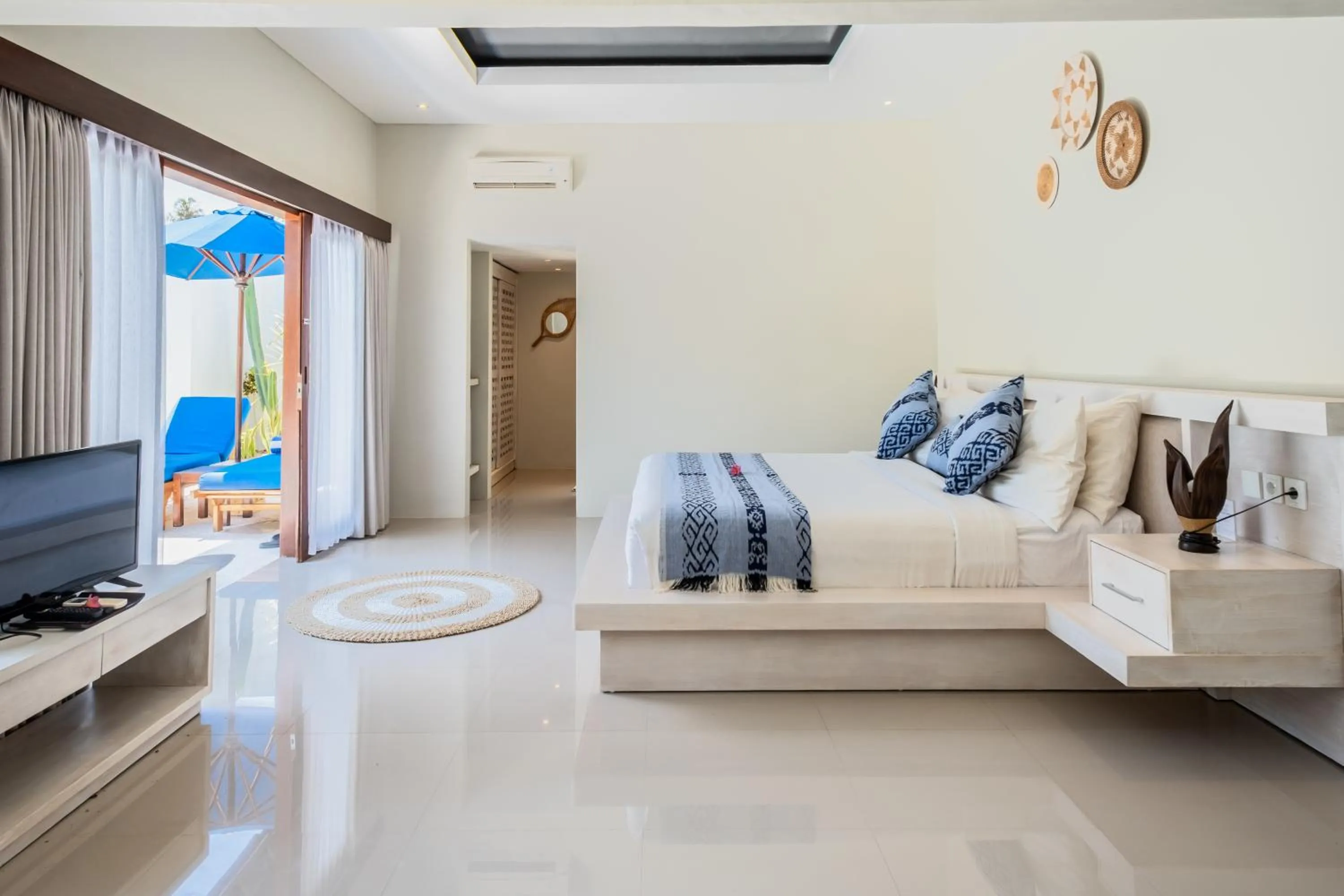 Bed in Living Asia Resort and Spa