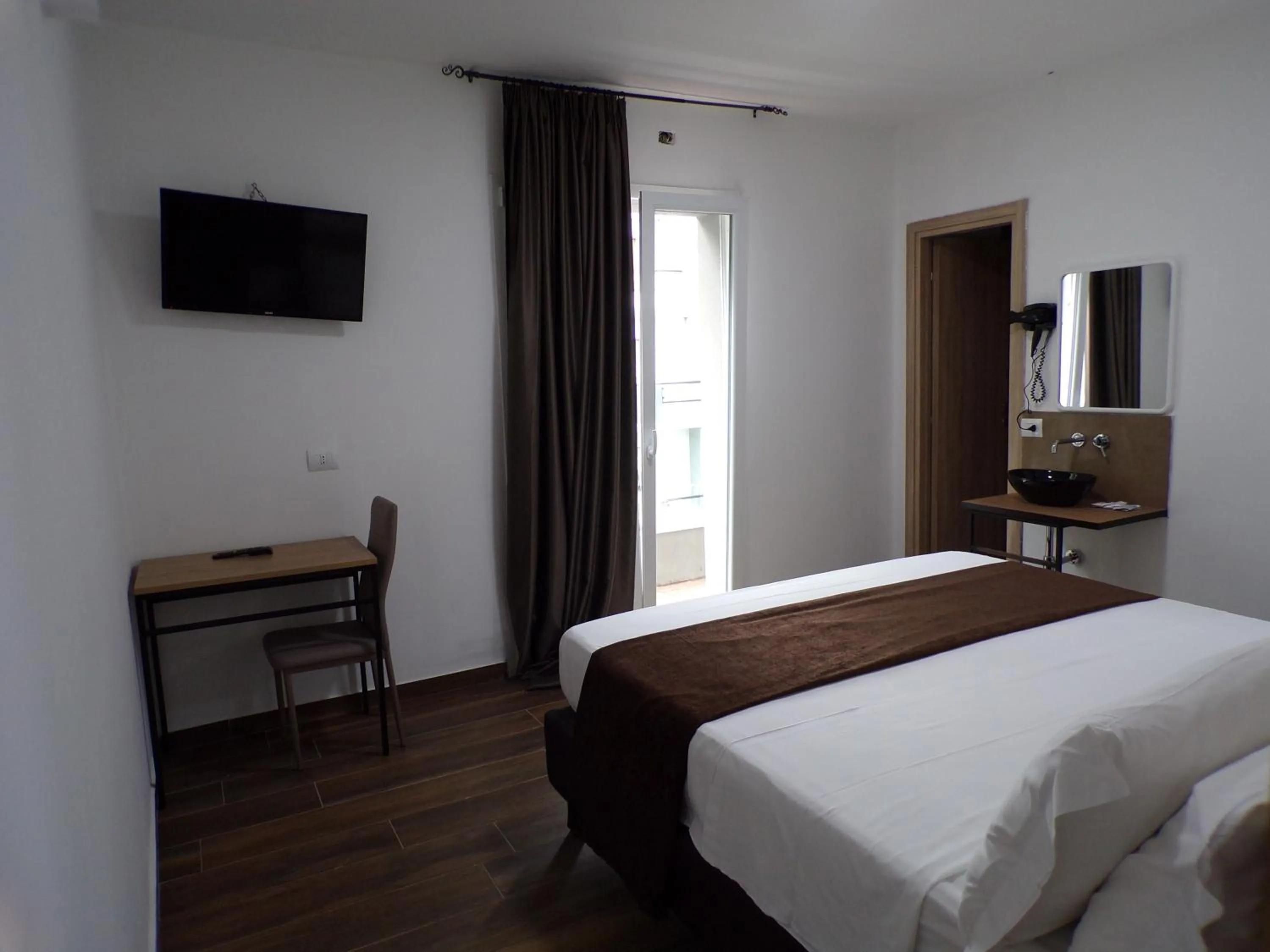 Bedroom in Hotel Nord Est