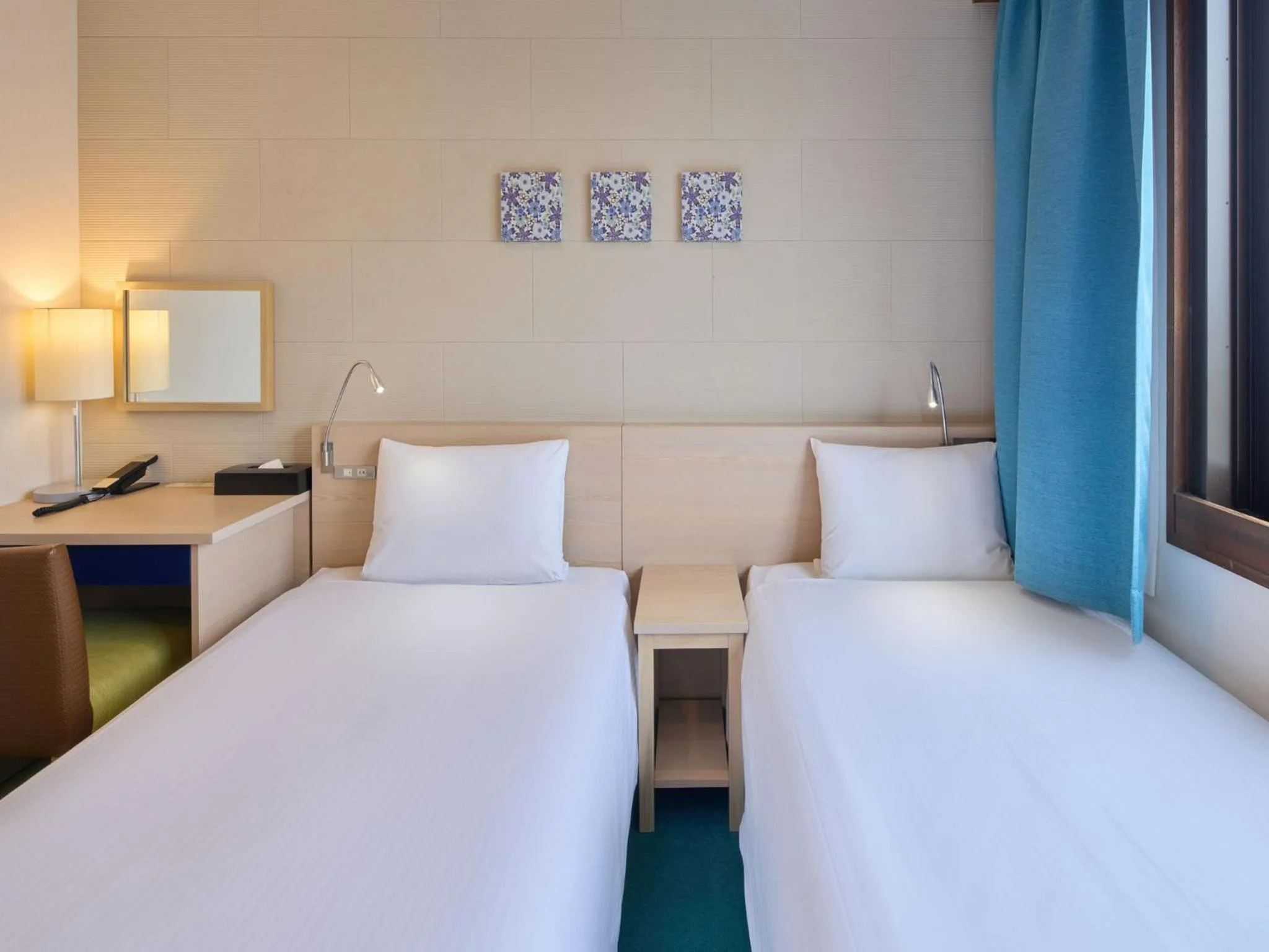 Bed in Hotel Yugaf Inn Okinawa