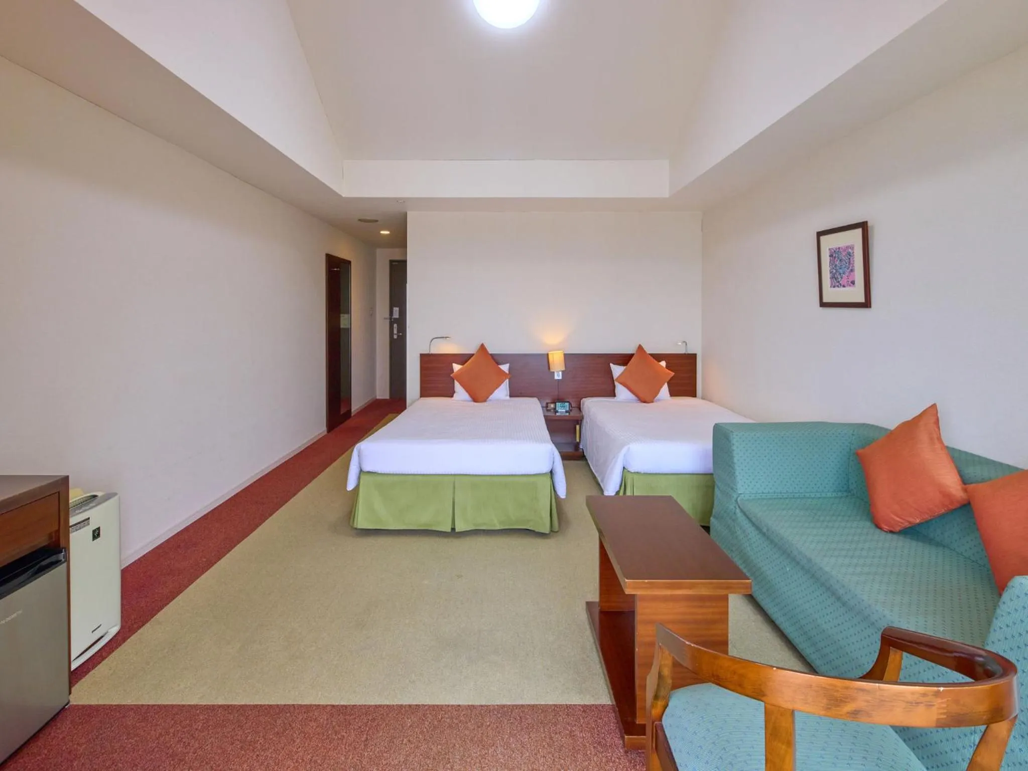 Bed in Hotel Yugaf Inn Okinawa