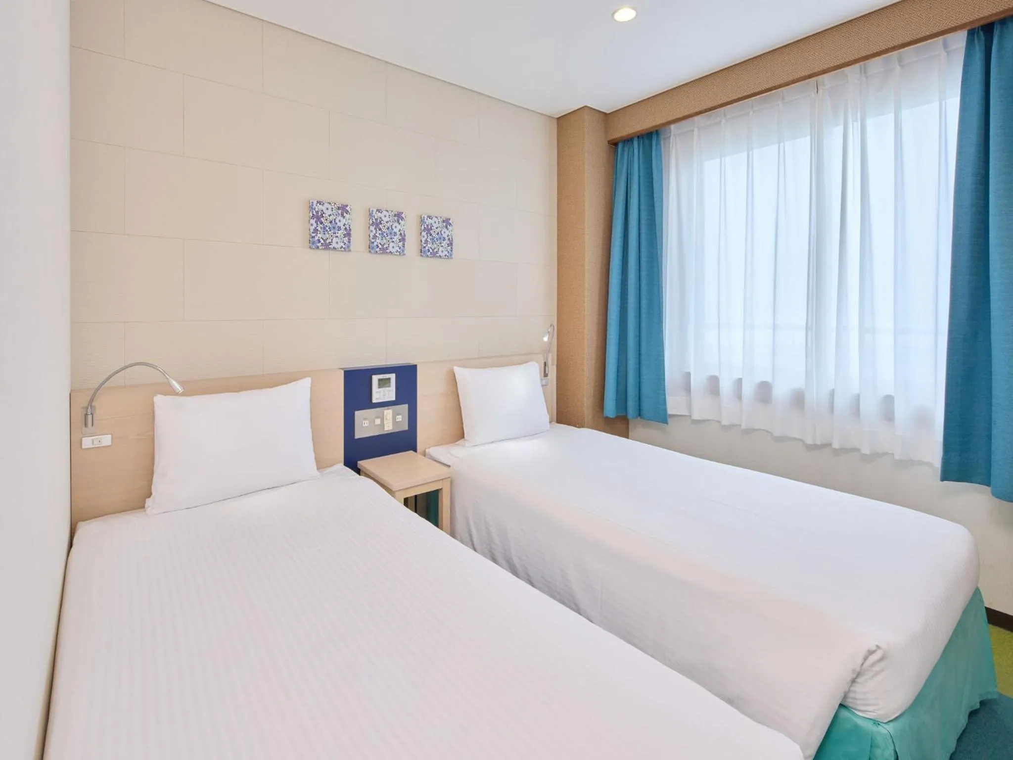 Bed in Hotel Yugaf Inn Okinawa