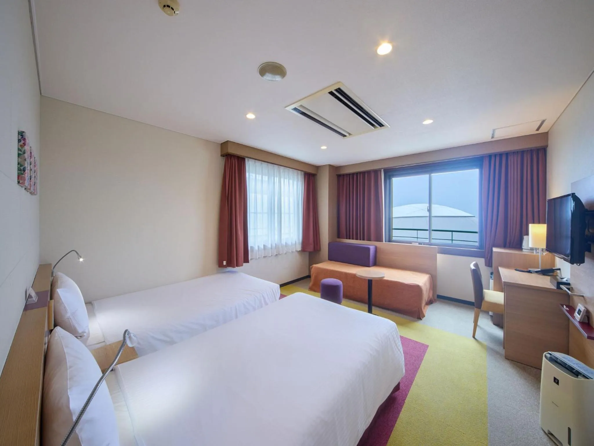 Bed in Hotel Yugaf Inn Okinawa