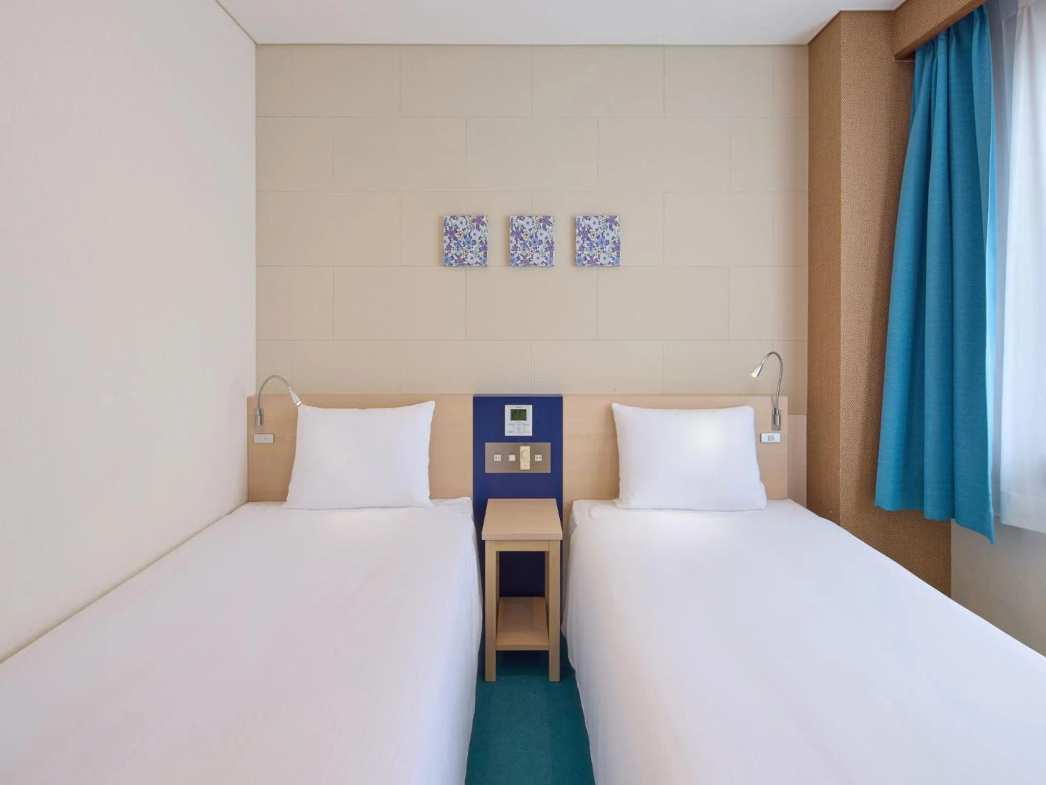 Bed in Hotel Yugaf Inn Okinawa