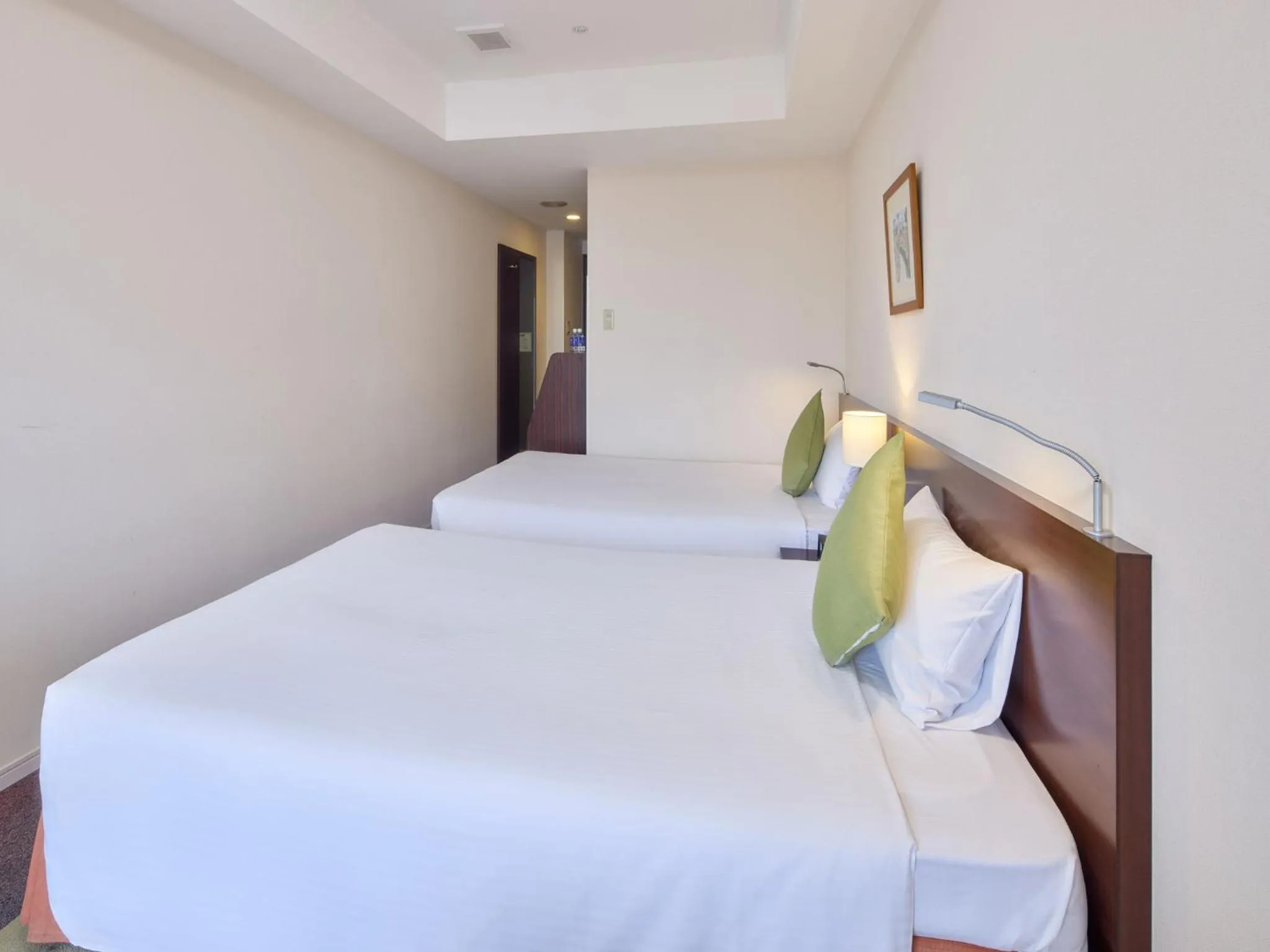 Bed in Hotel Yugaf Inn Okinawa