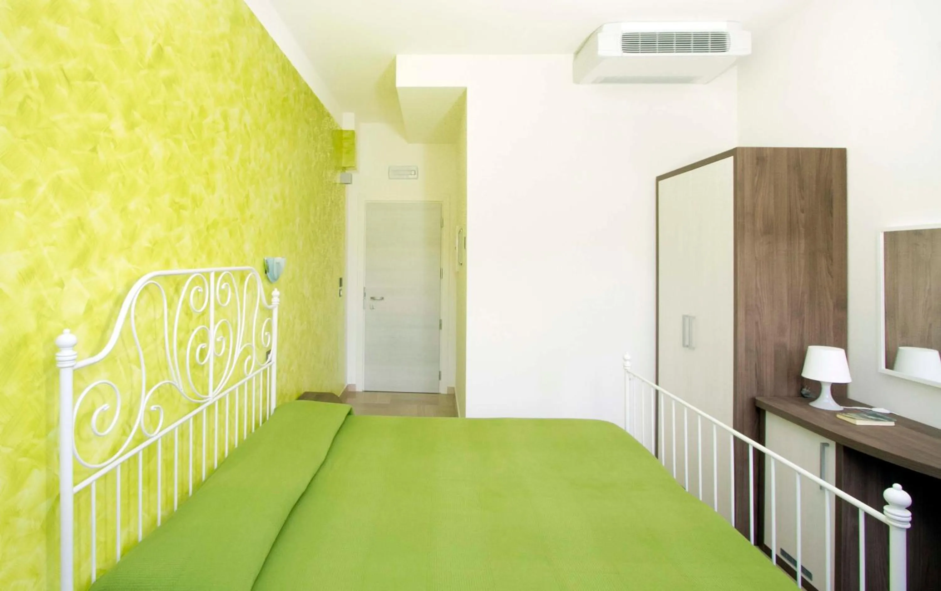 Bed in Hotel La Maestra