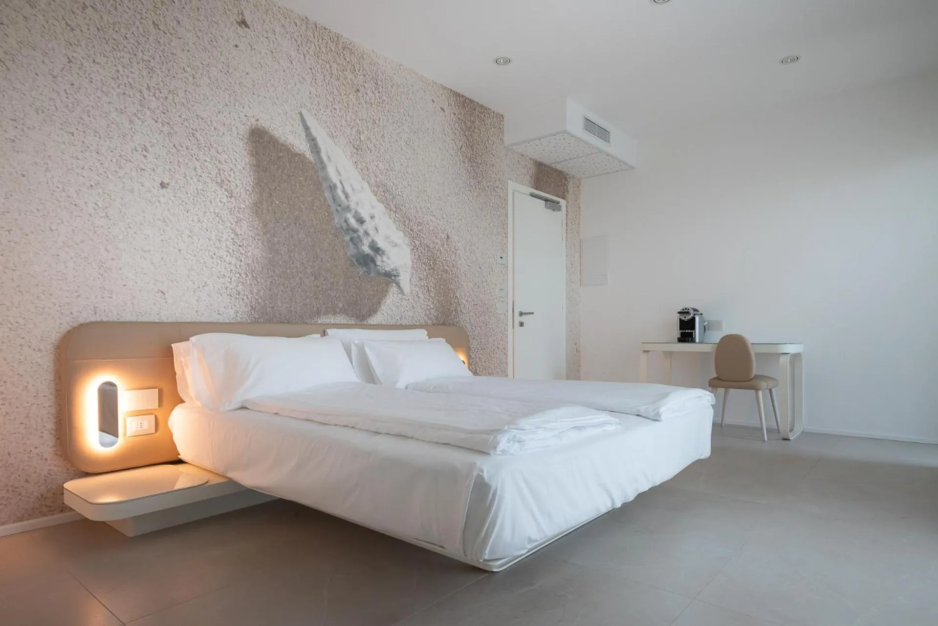 Bed in Unico Hotel Caorle