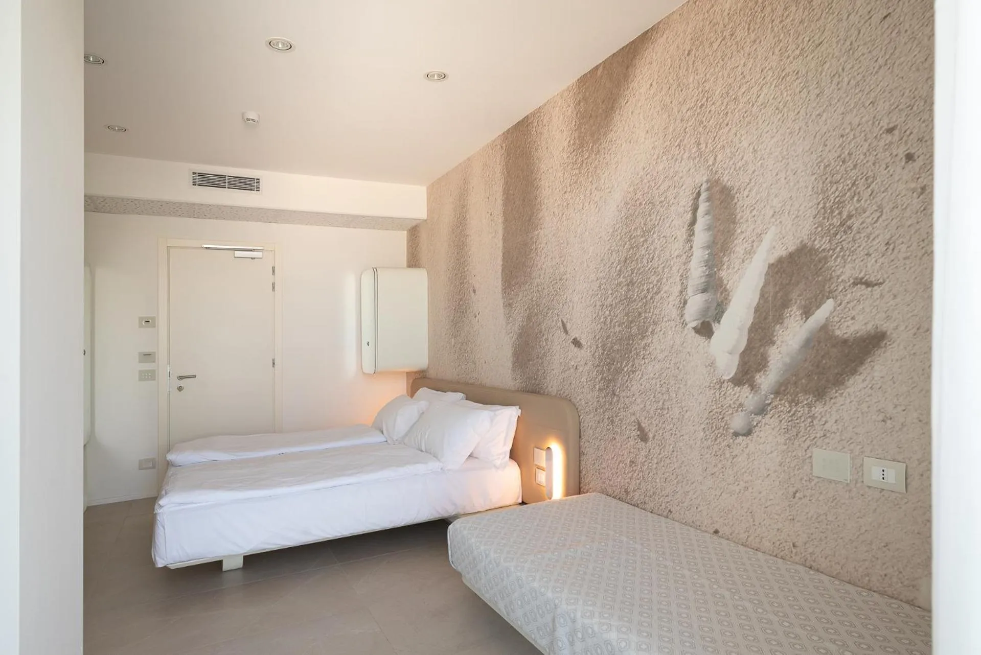 Photo of the whole room, Bed in Unico Hotel Caorle