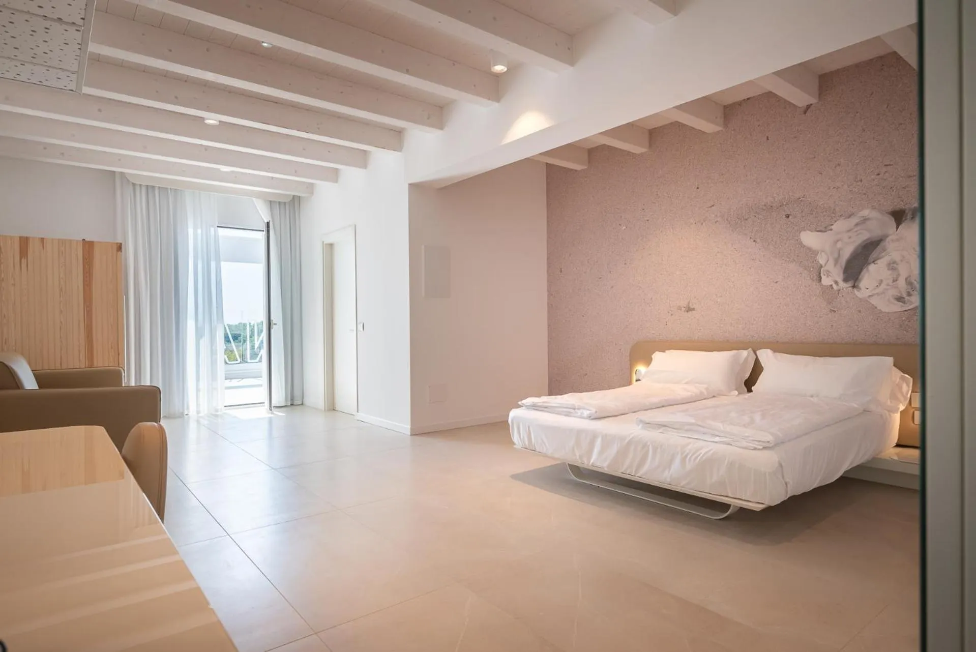 Photo of the whole room, Bed in Unico Hotel Caorle