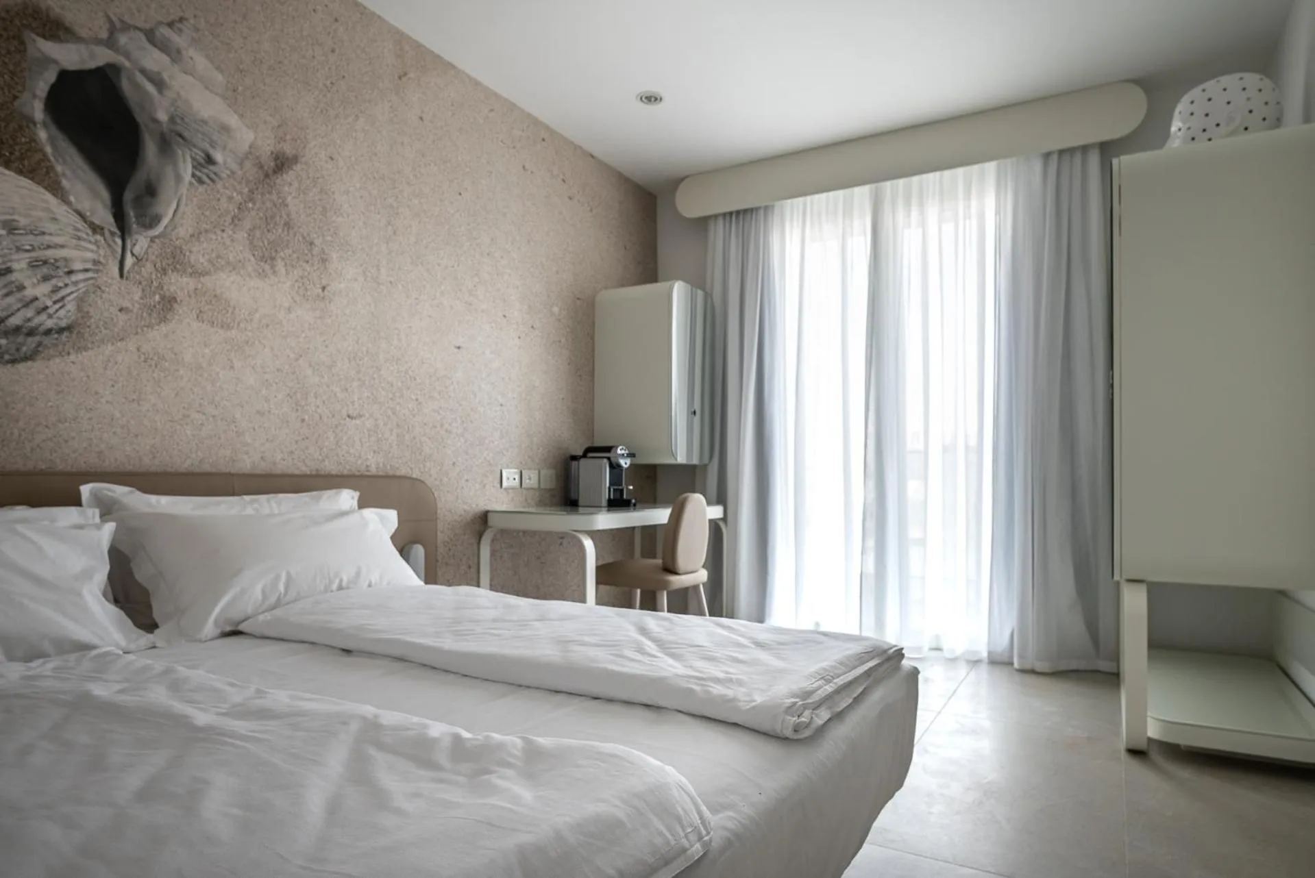 Photo of the whole room, Bed in Unico Hotel Caorle