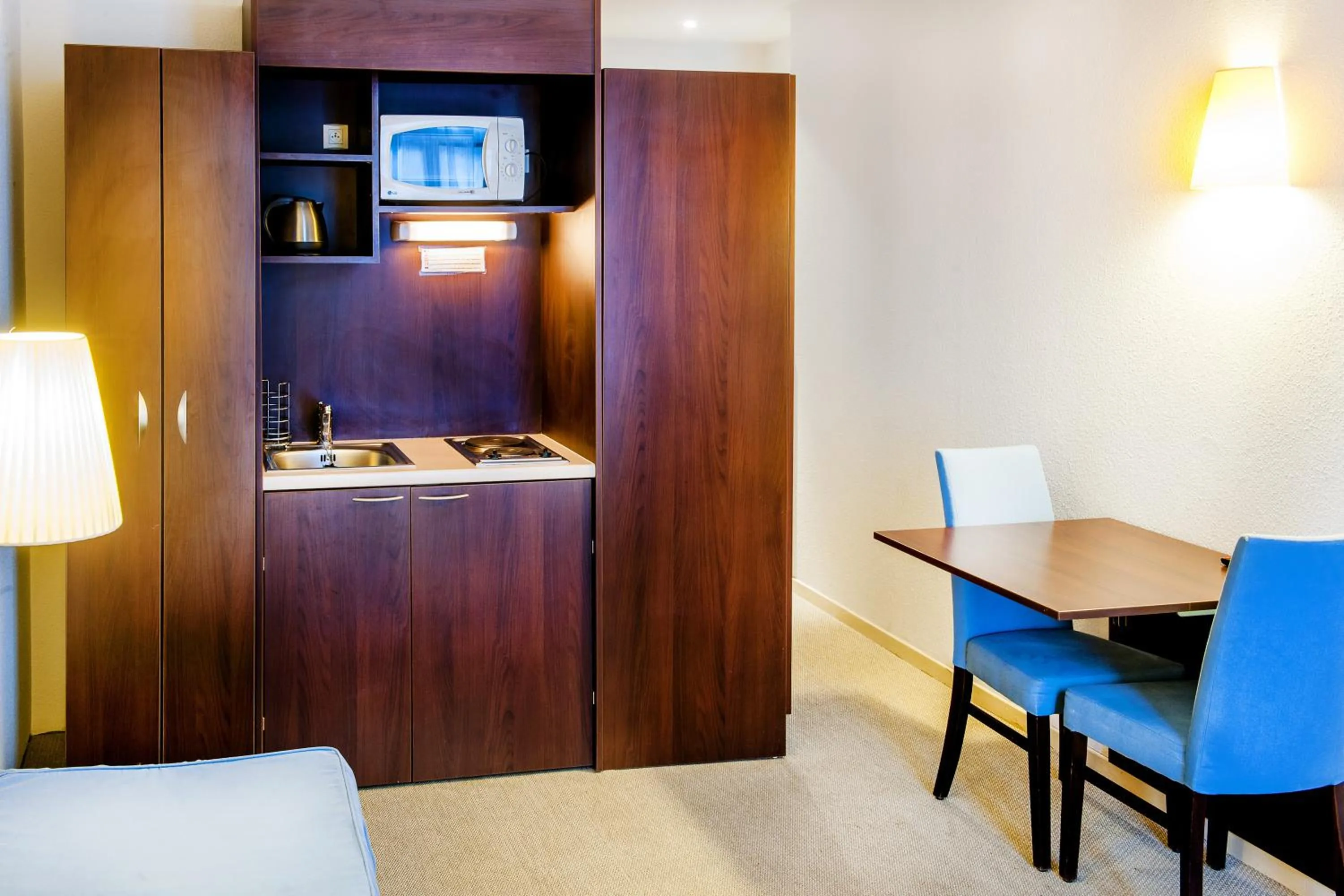 Kitchen or kitchenette in Appart'hôtel Saint Jean