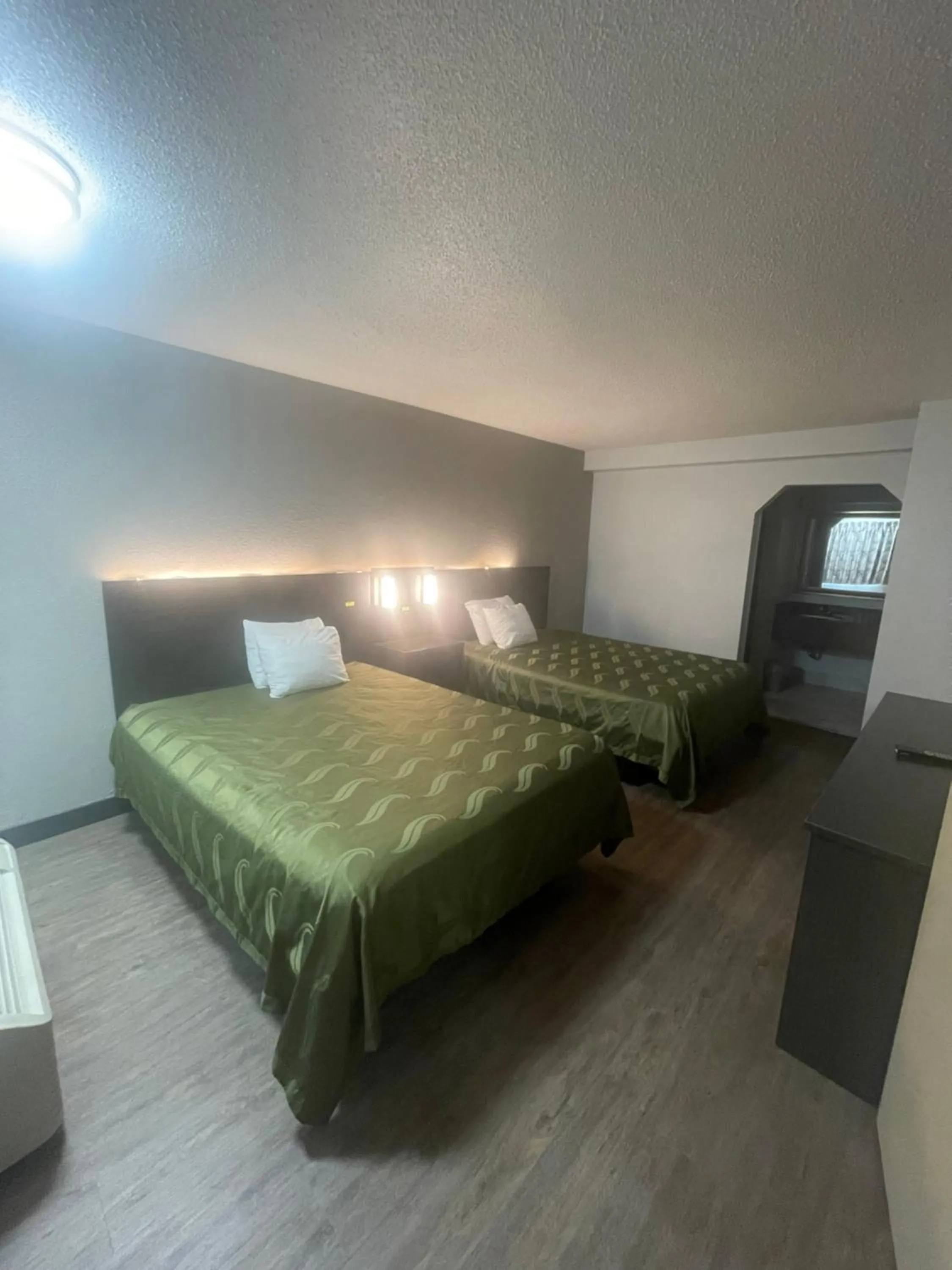 Bedroom, Bed in FairBridge Inn & Suites