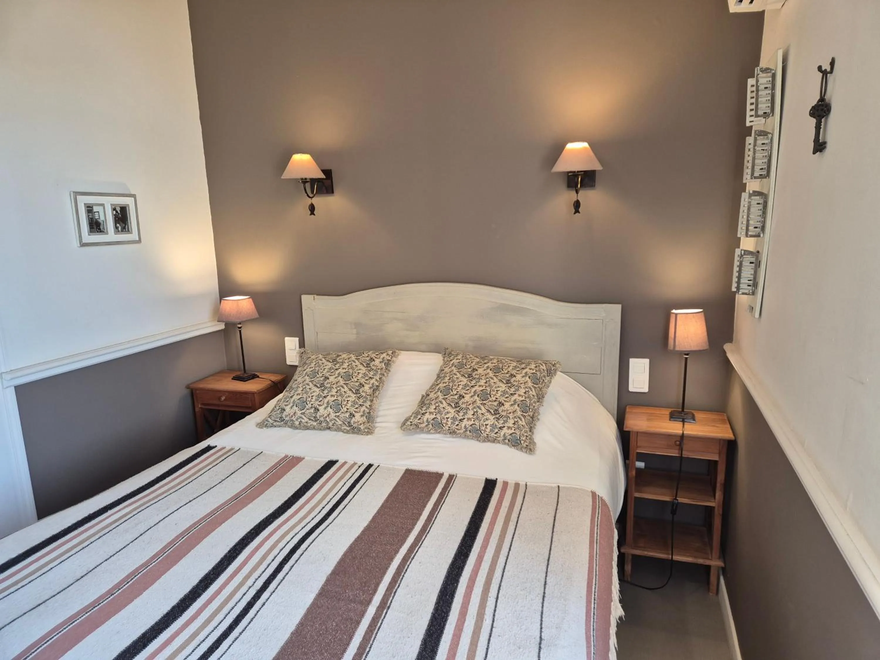 Bed in LogisHotels Le Relais du Quercy