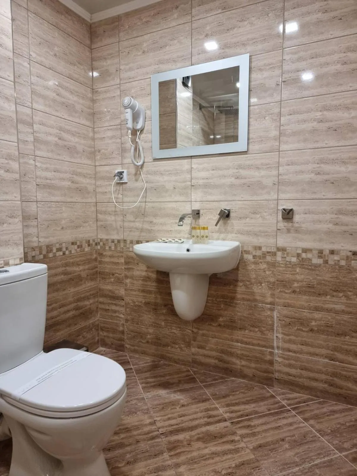 Bathroom in Family Hotel Alfa Vita