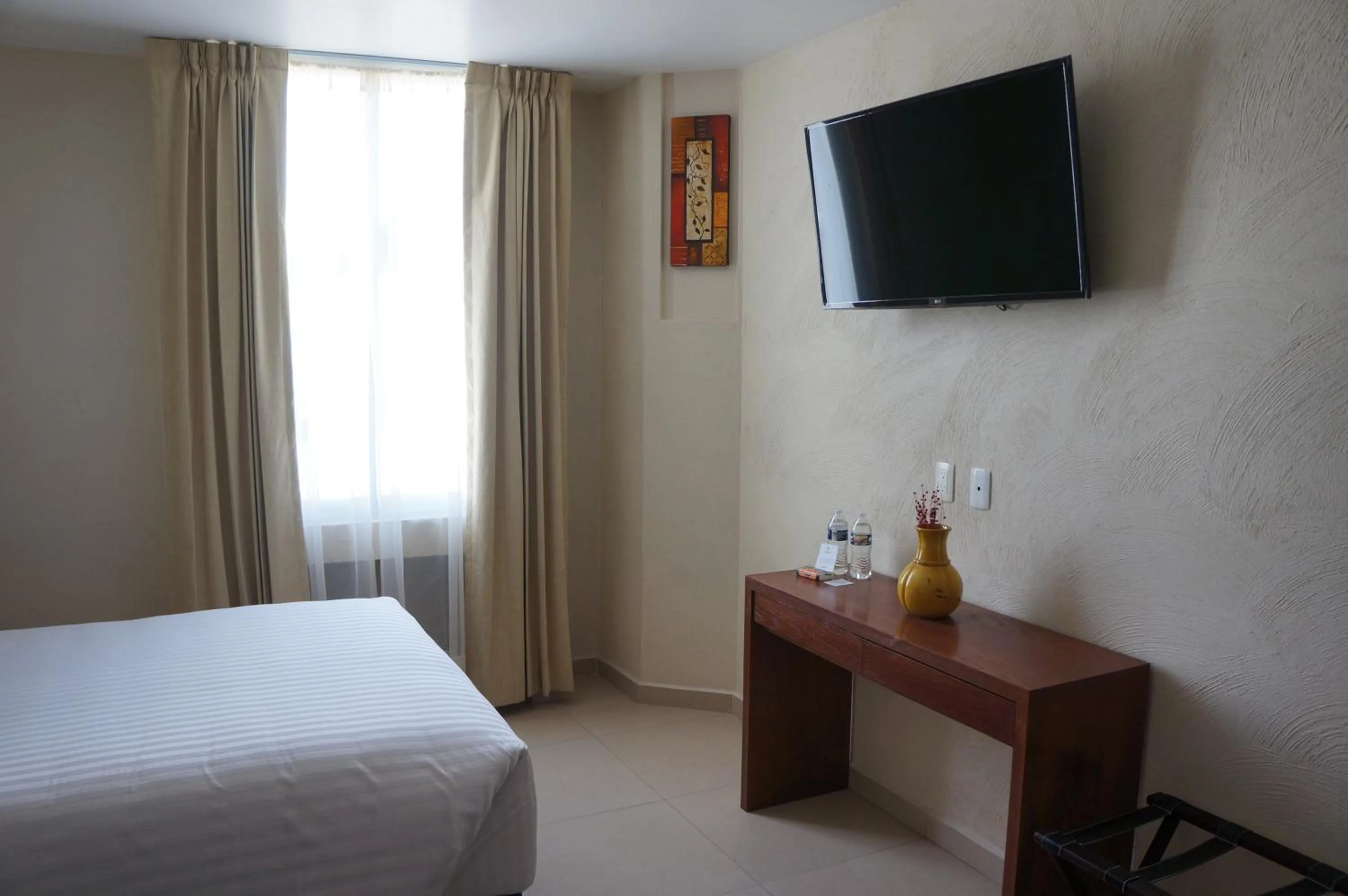 Bed in Hotel Mirante Tlaxcala