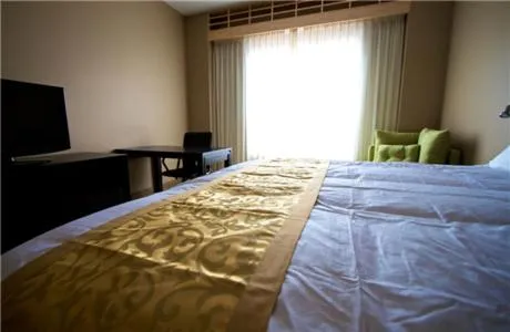 Bed, TV/Entertainment Center in Casulo Hotel