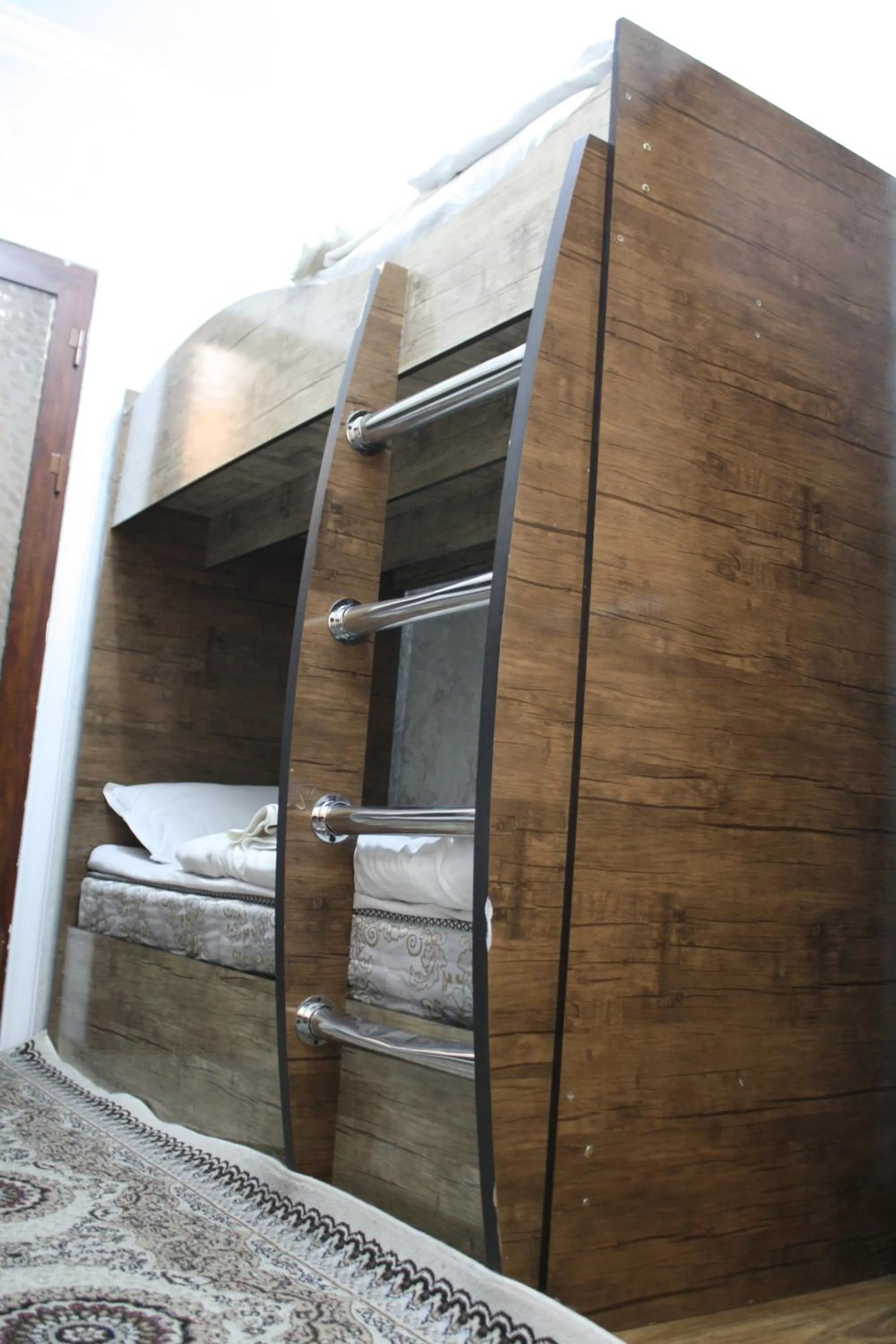 Bed in Tilyakori Hotel