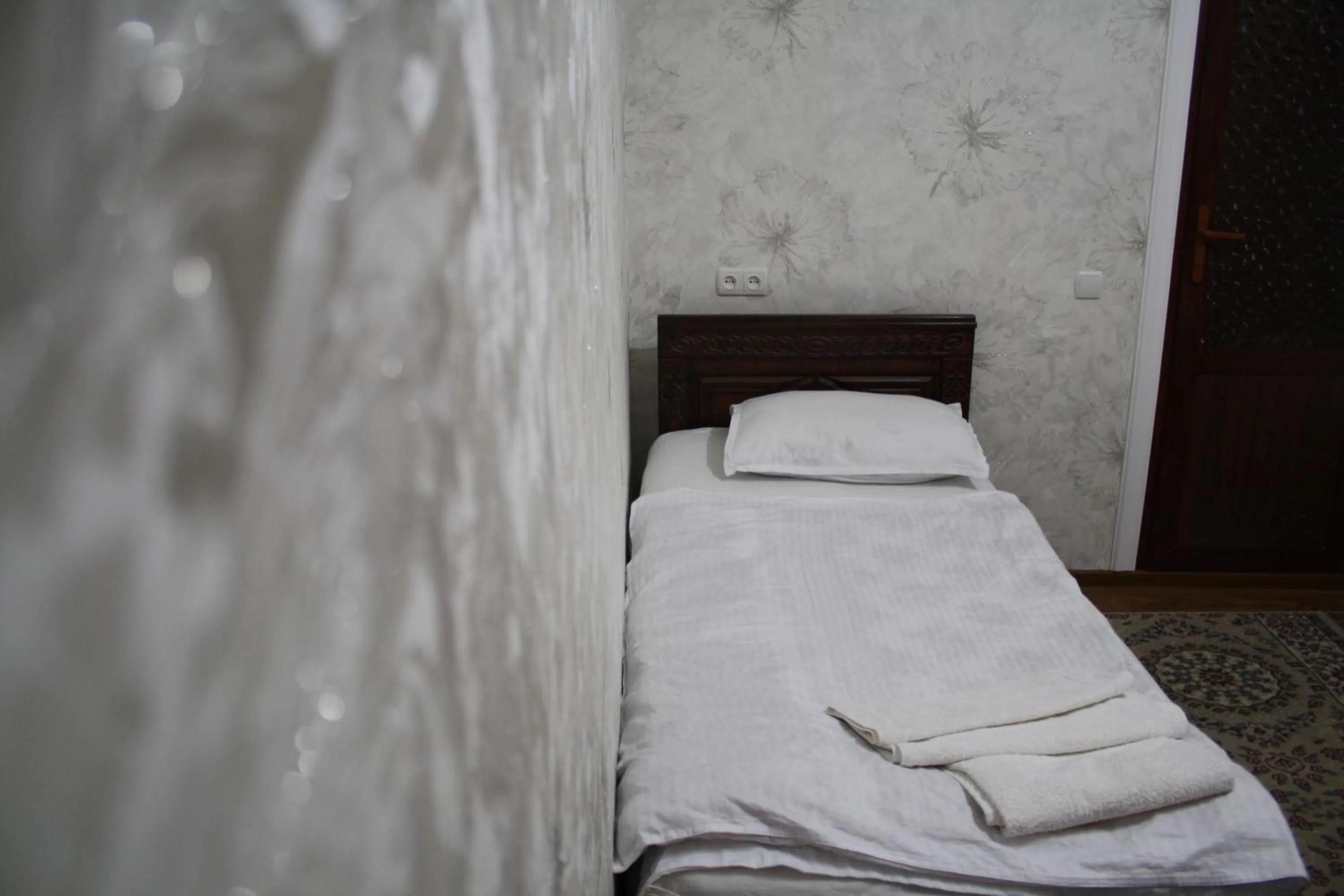 Bed in Tilyakori Hotel