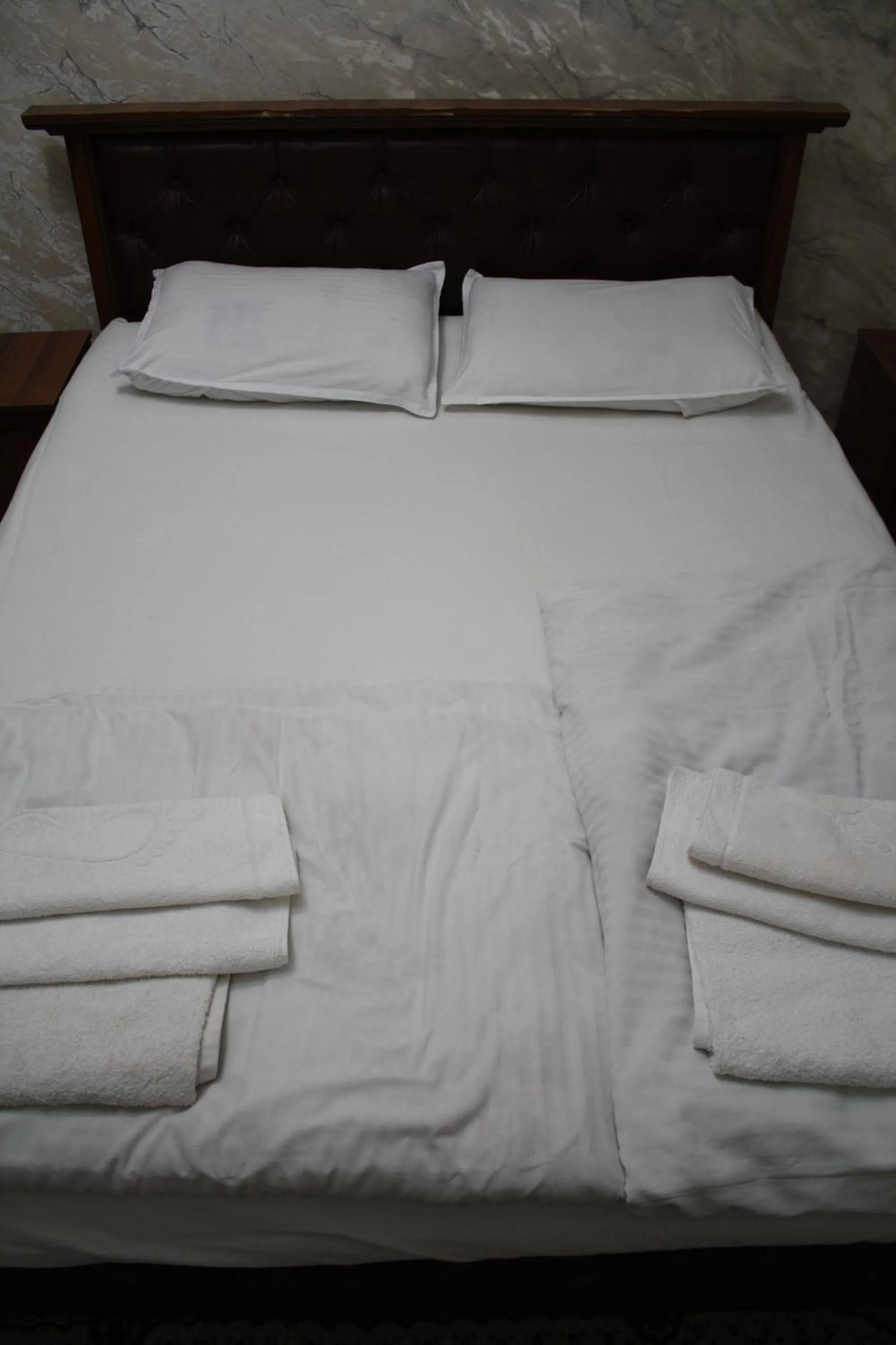 Bed in Tilyakori Hotel