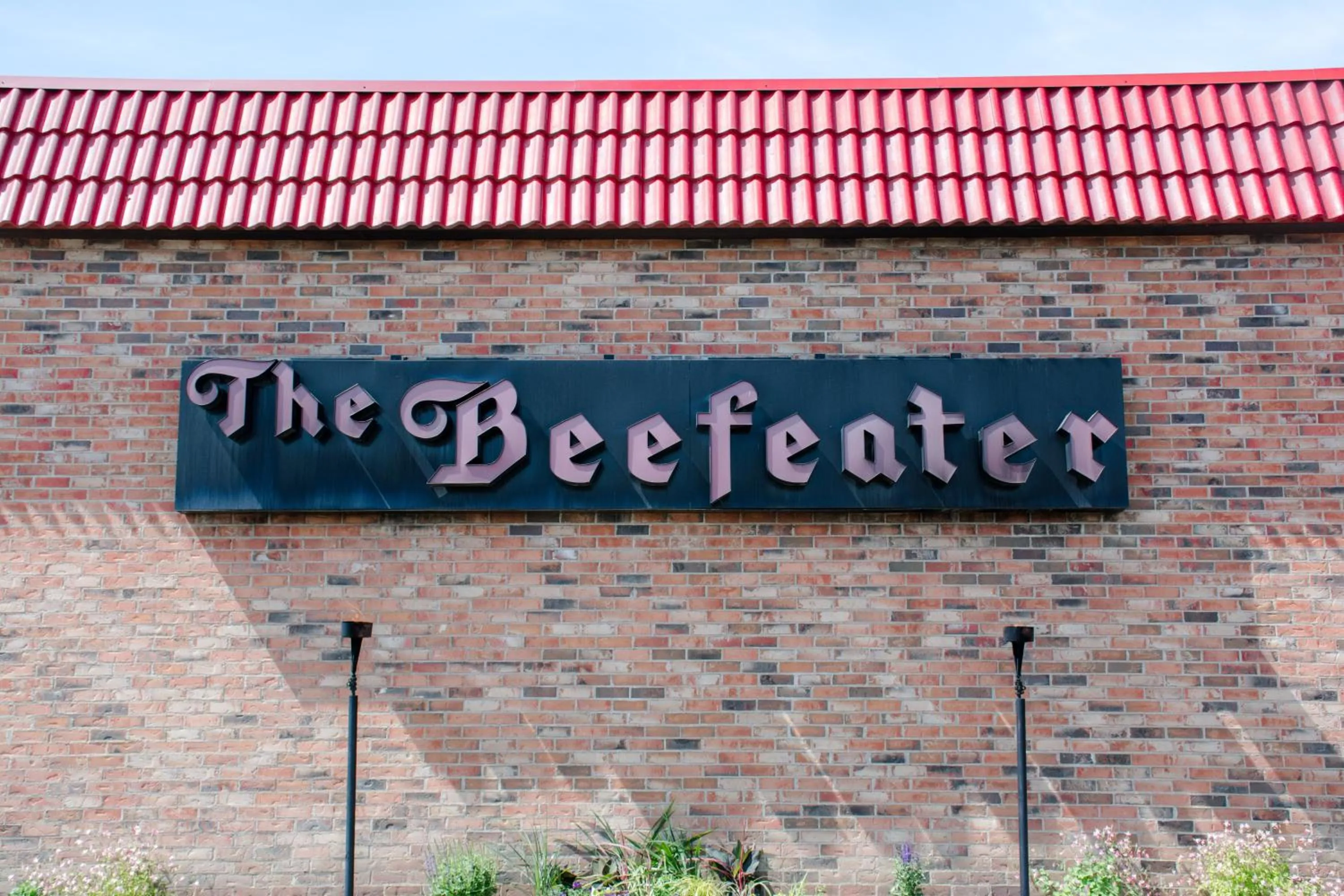 Property logo or sign in Ramada by Wyndham Medicine Hat