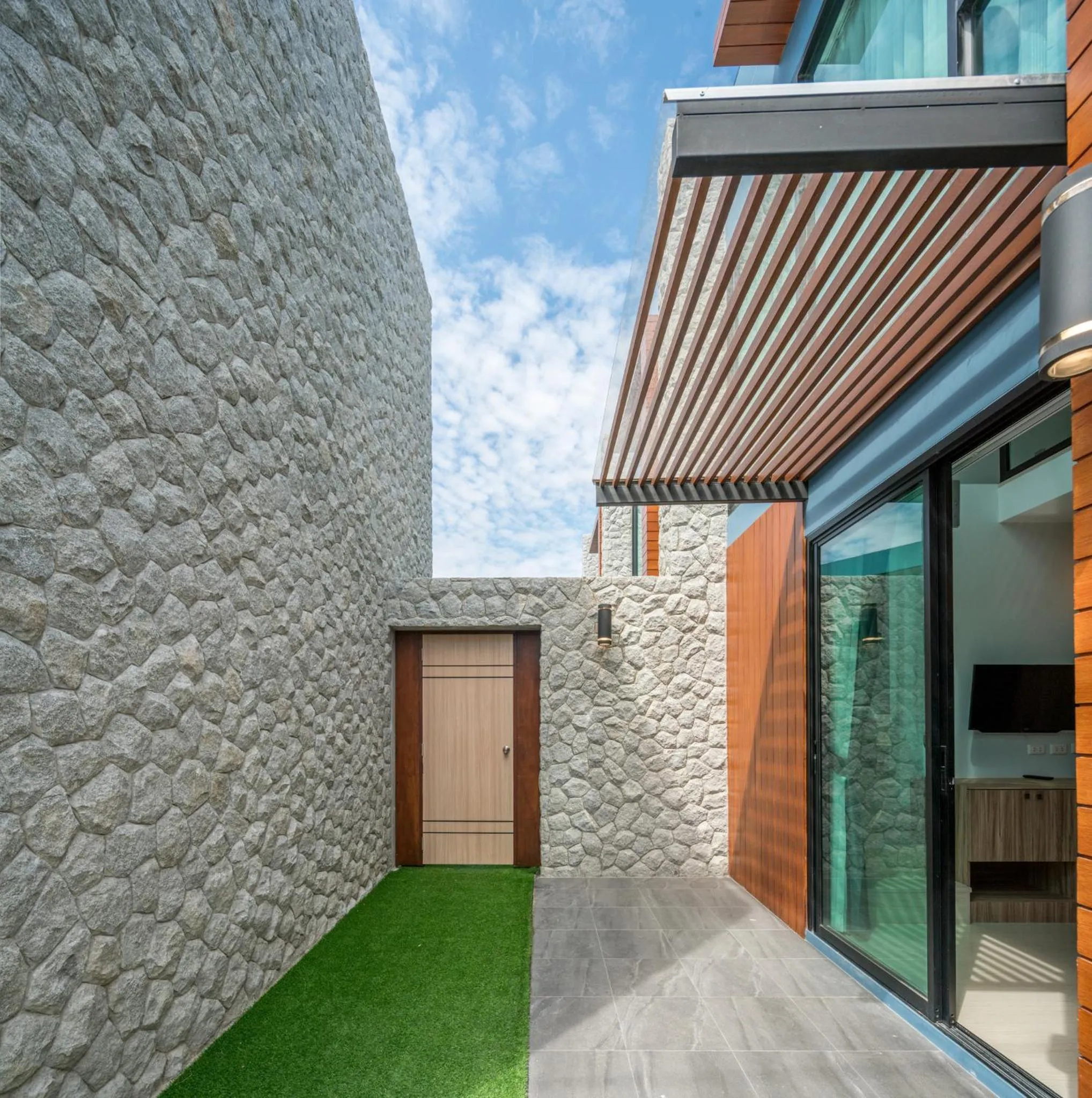 Facade/entrance in Peace Blue Naiharn Naturist Resort Phuket SHA Extra Plus