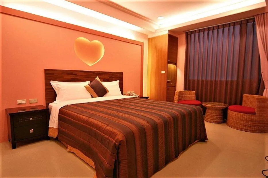 Bed in Tranquil Sea Hotel