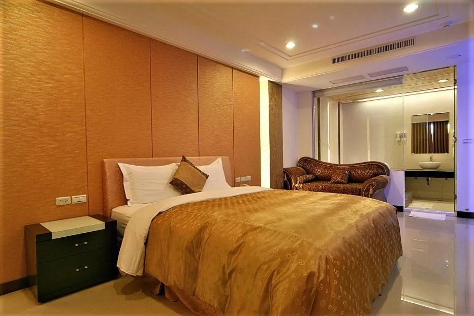 Bed in Tranquil Sea Hotel