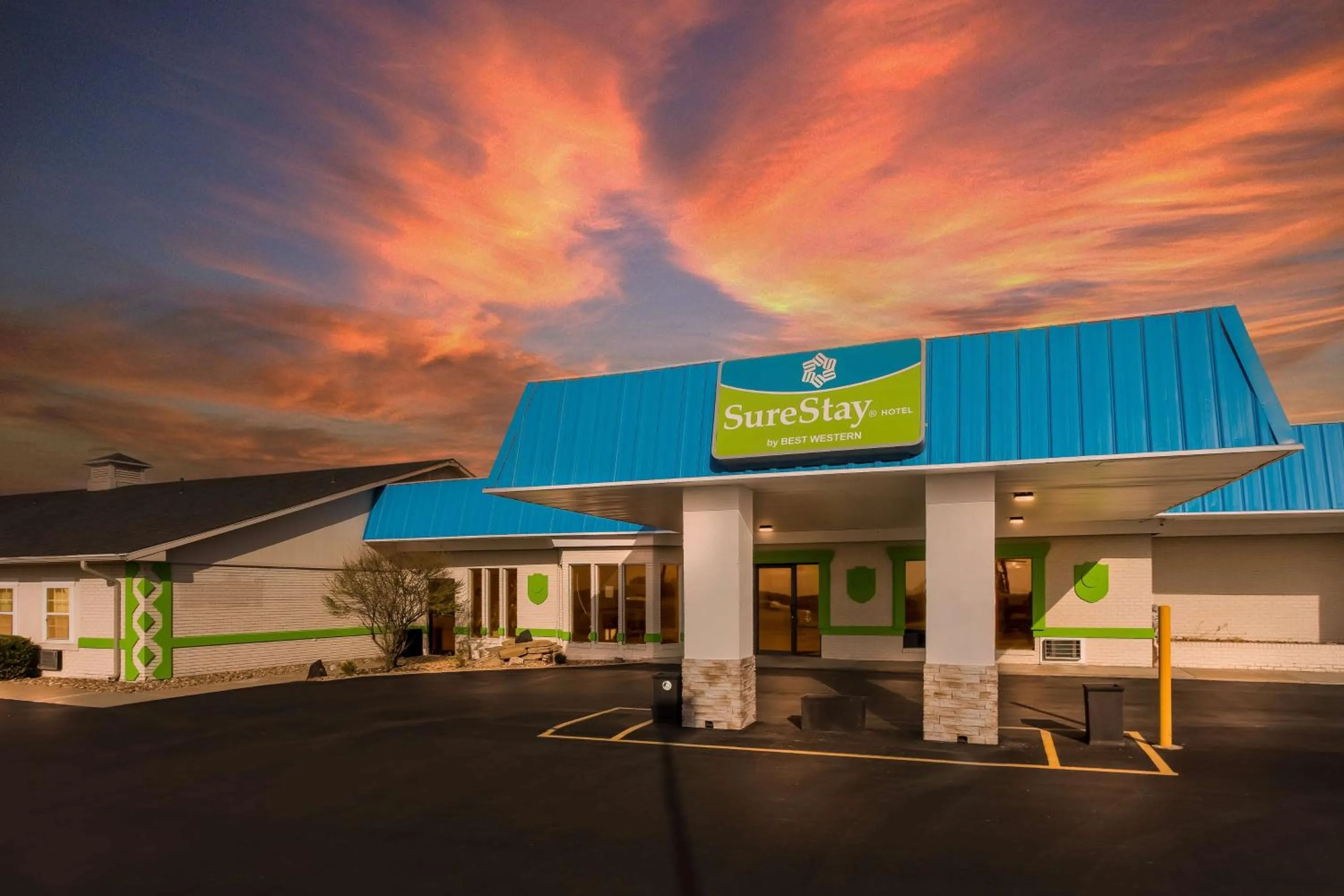 Property building in SureStay Hotel by Best Western Higginsville