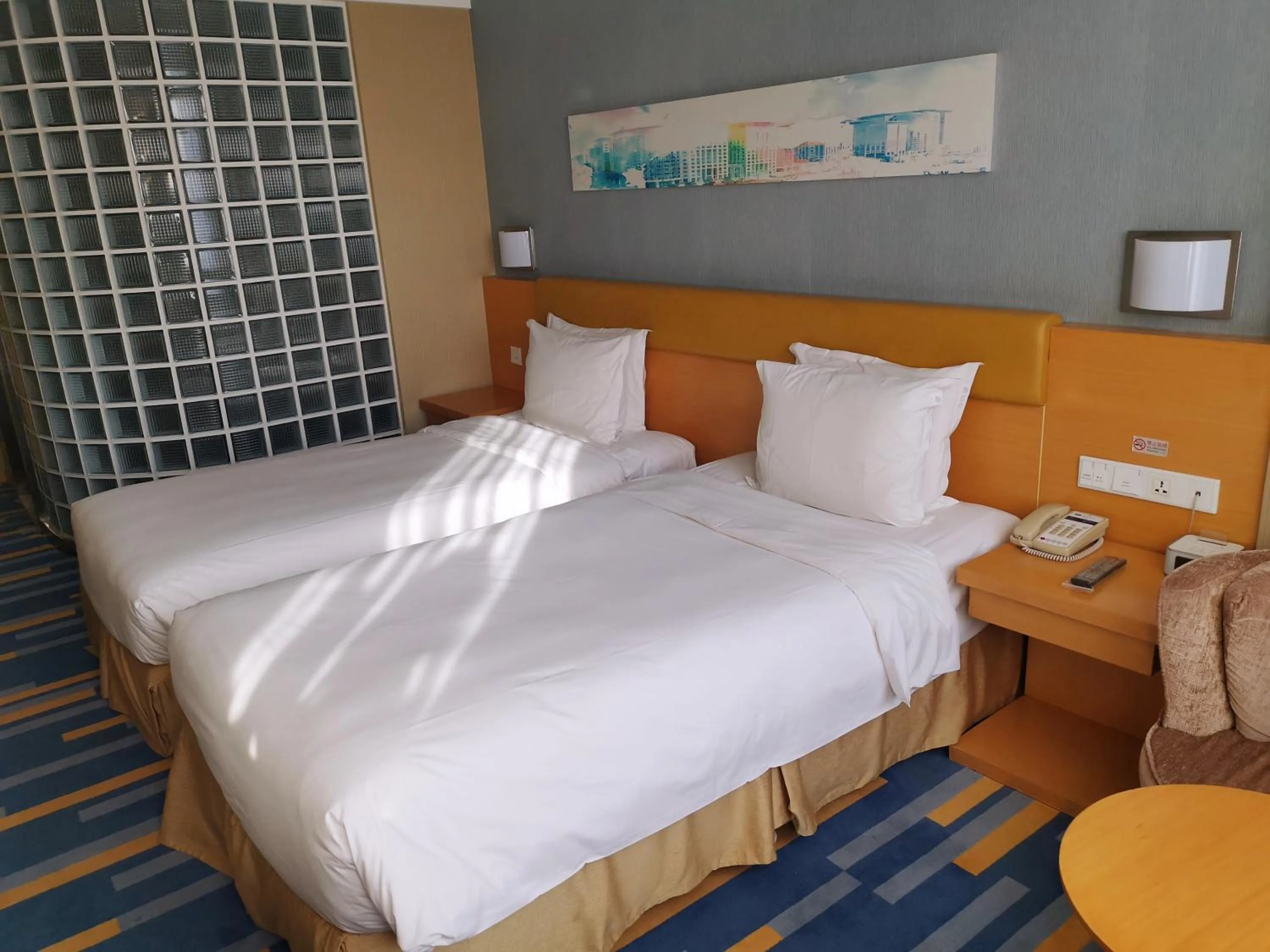 Bed in Holiday Inn Express Beijing Airport Zone, an IHG Hotel