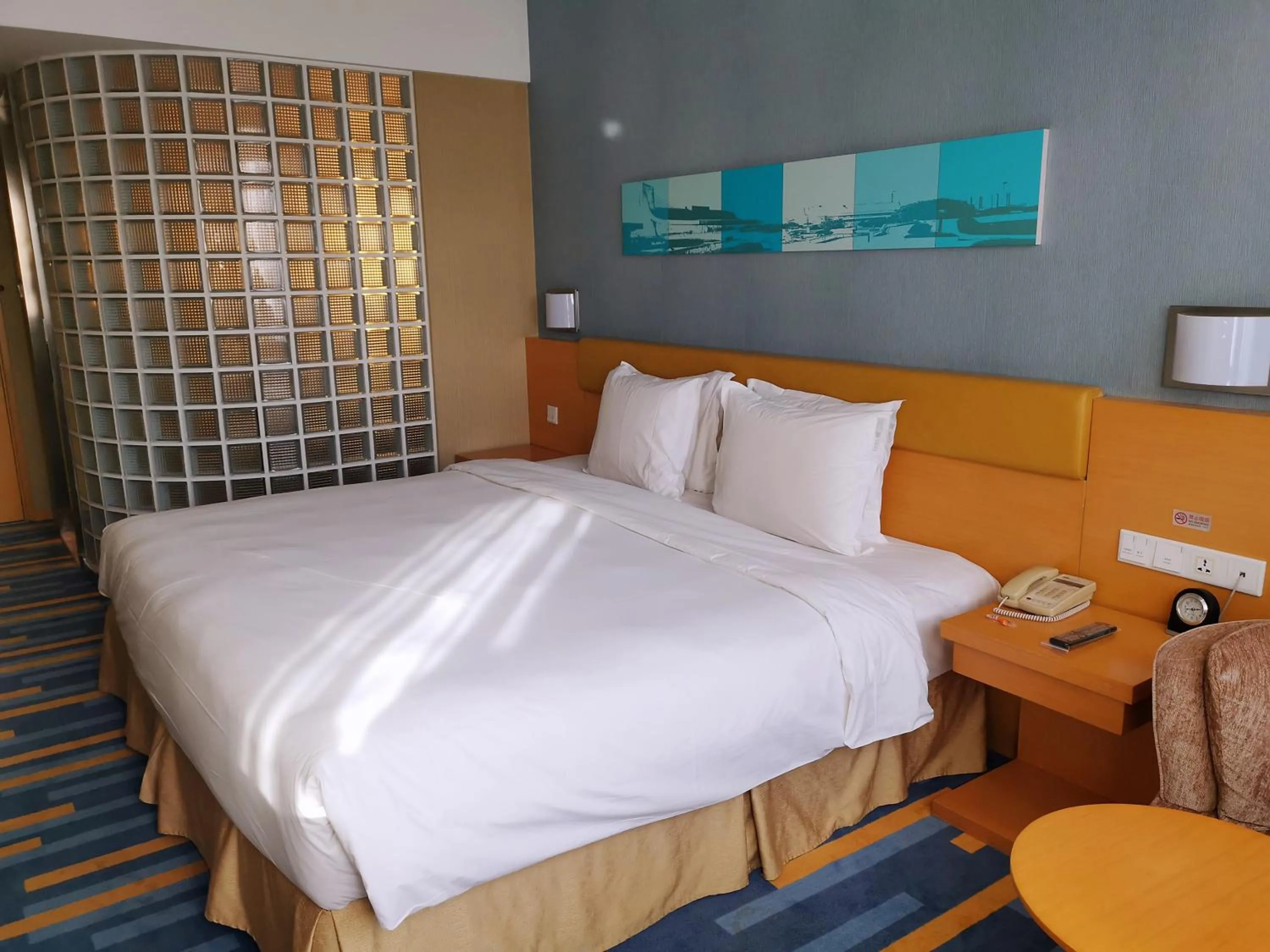Bed in Holiday Inn Express Beijing Airport Zone, an IHG Hotel