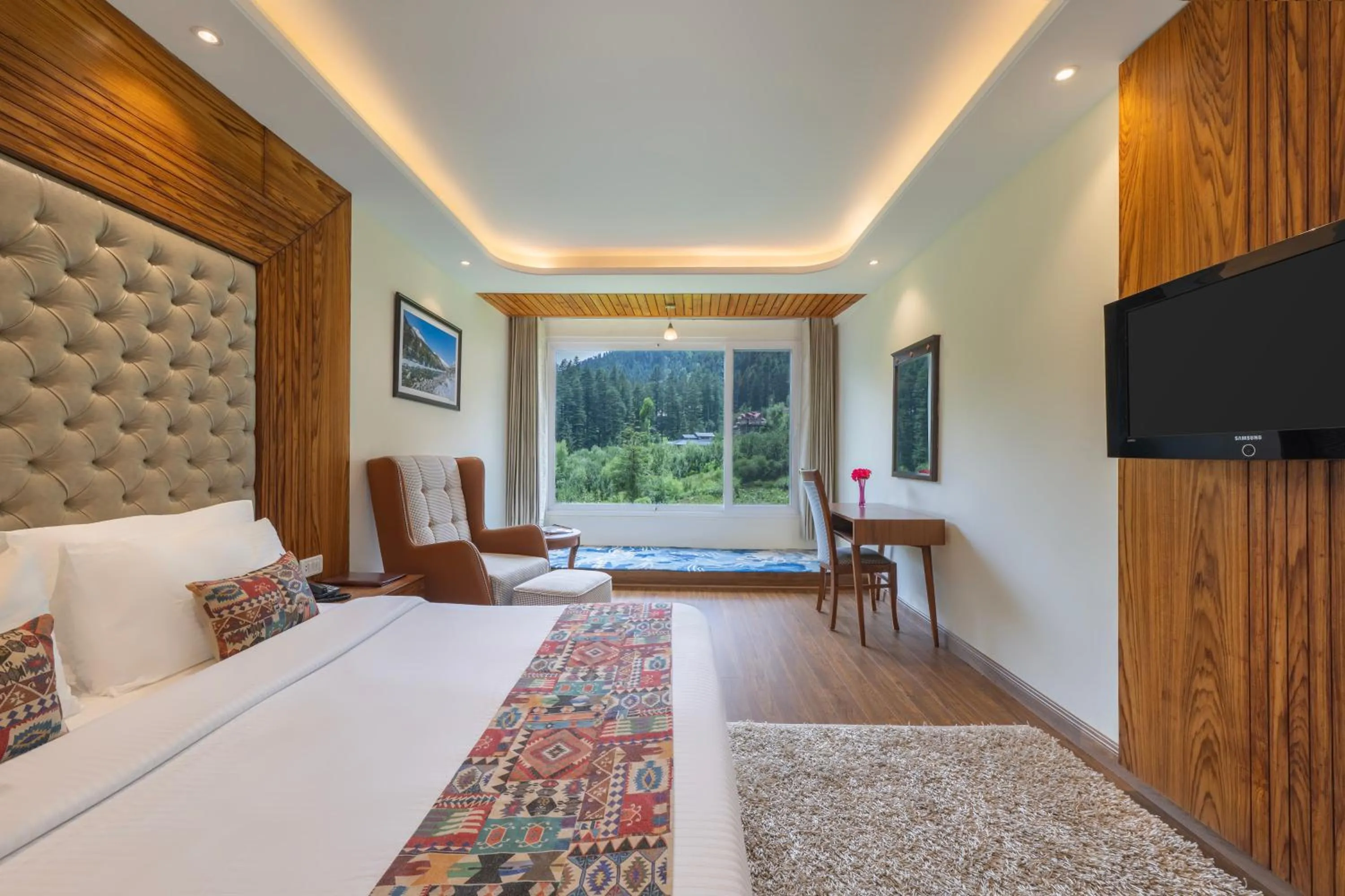 Bed in Snow Valley Resorts & Spa Manali