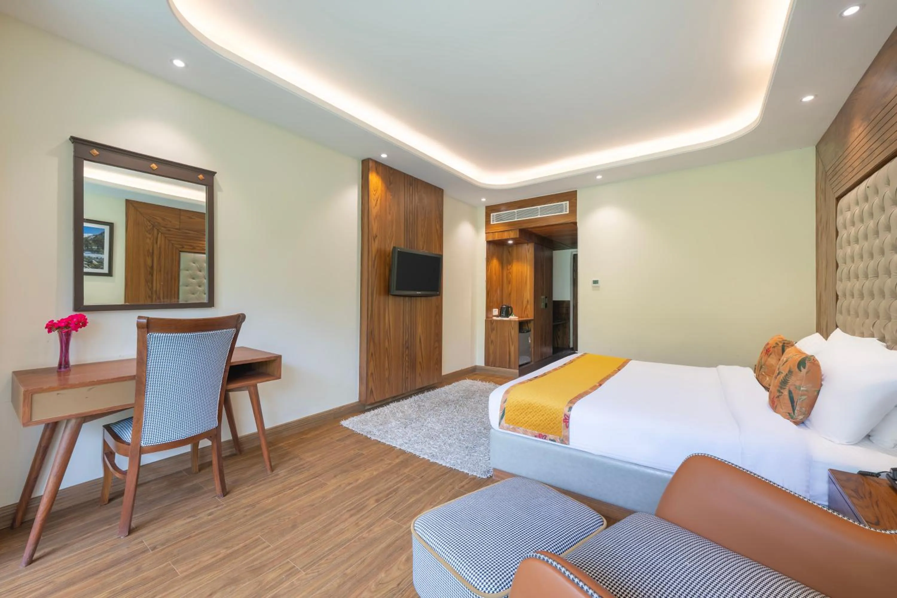 Bed in Snow Valley Resorts & Spa Manali