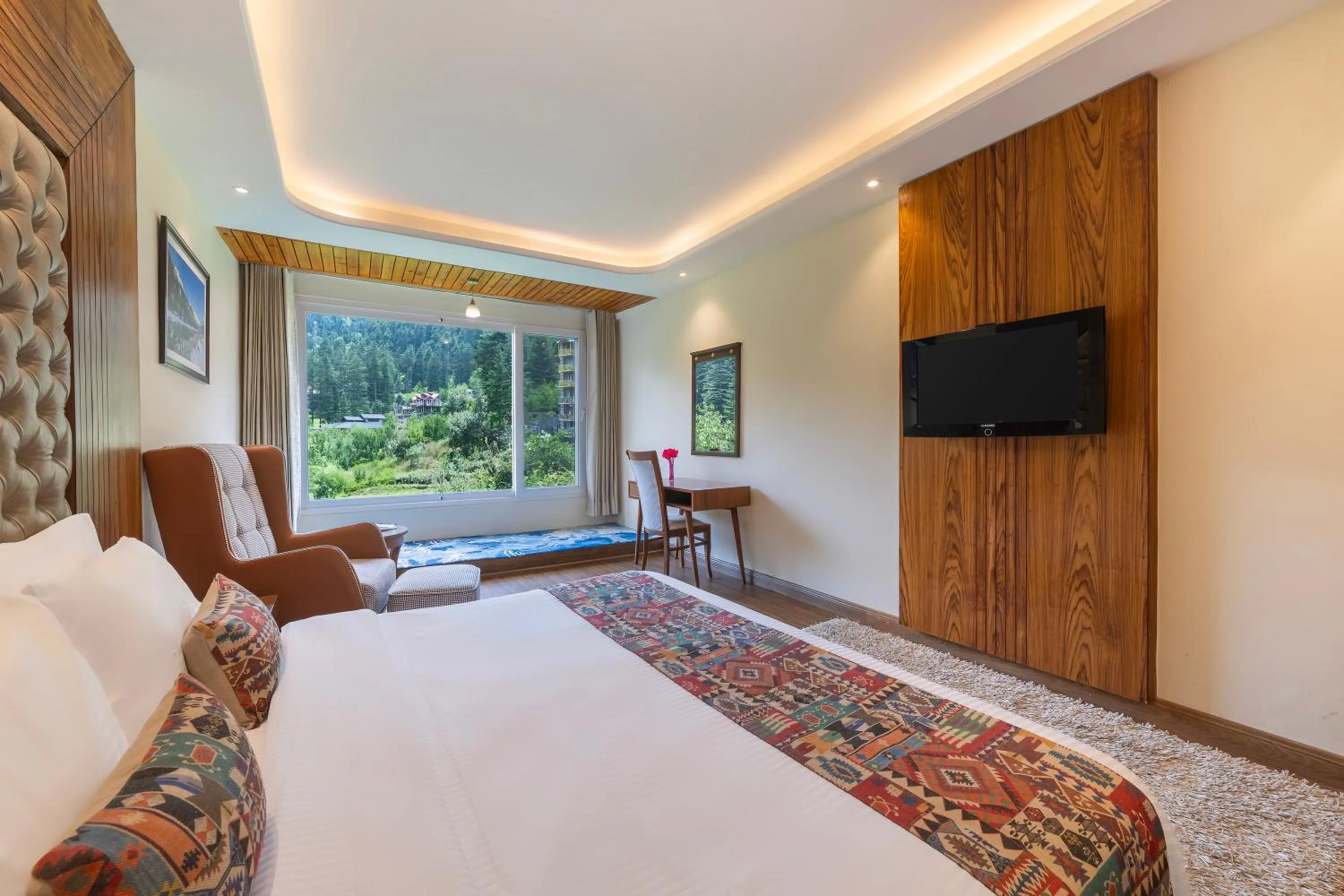 Bed in Snow Valley Resorts & Spa Manali