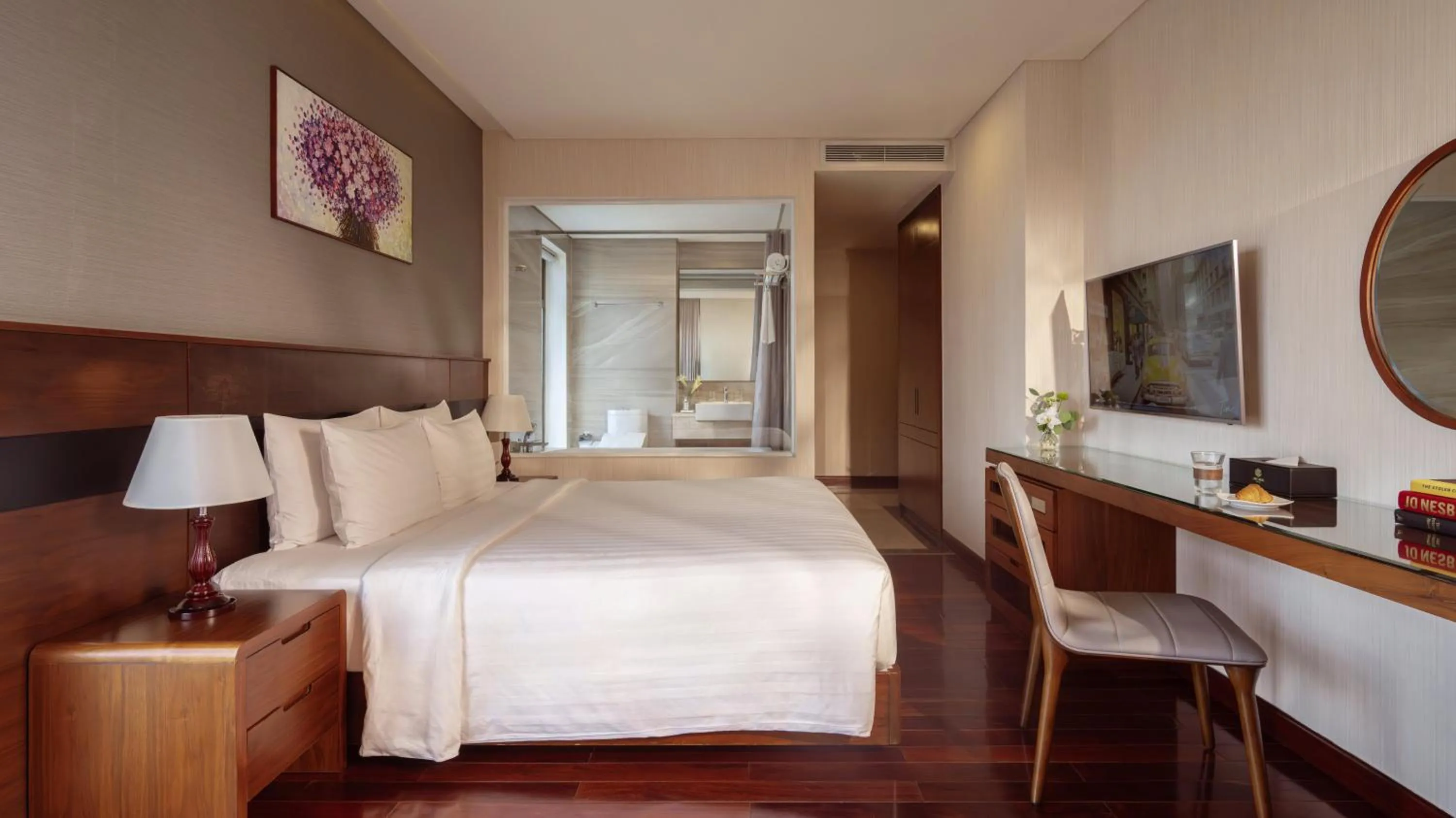 Bed in Orchids Saigon Hotel