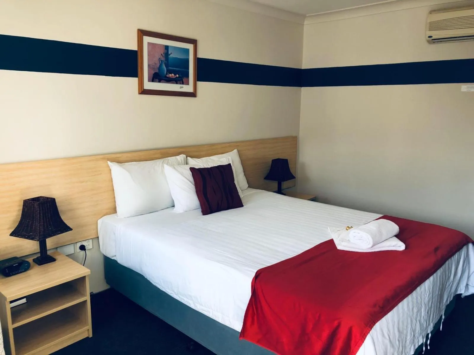 Bed in Red Cedar Motel