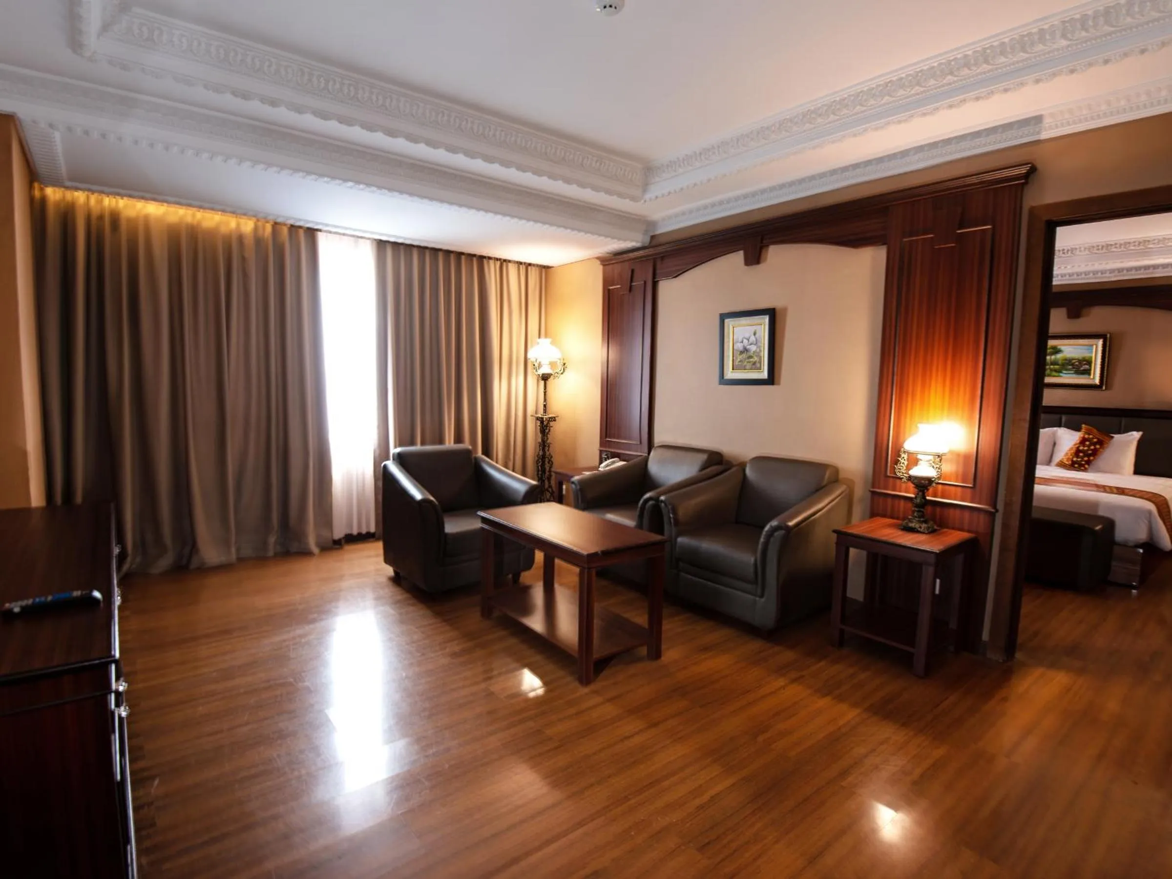 Seating area, Bed in The Rich Jogja Hotel