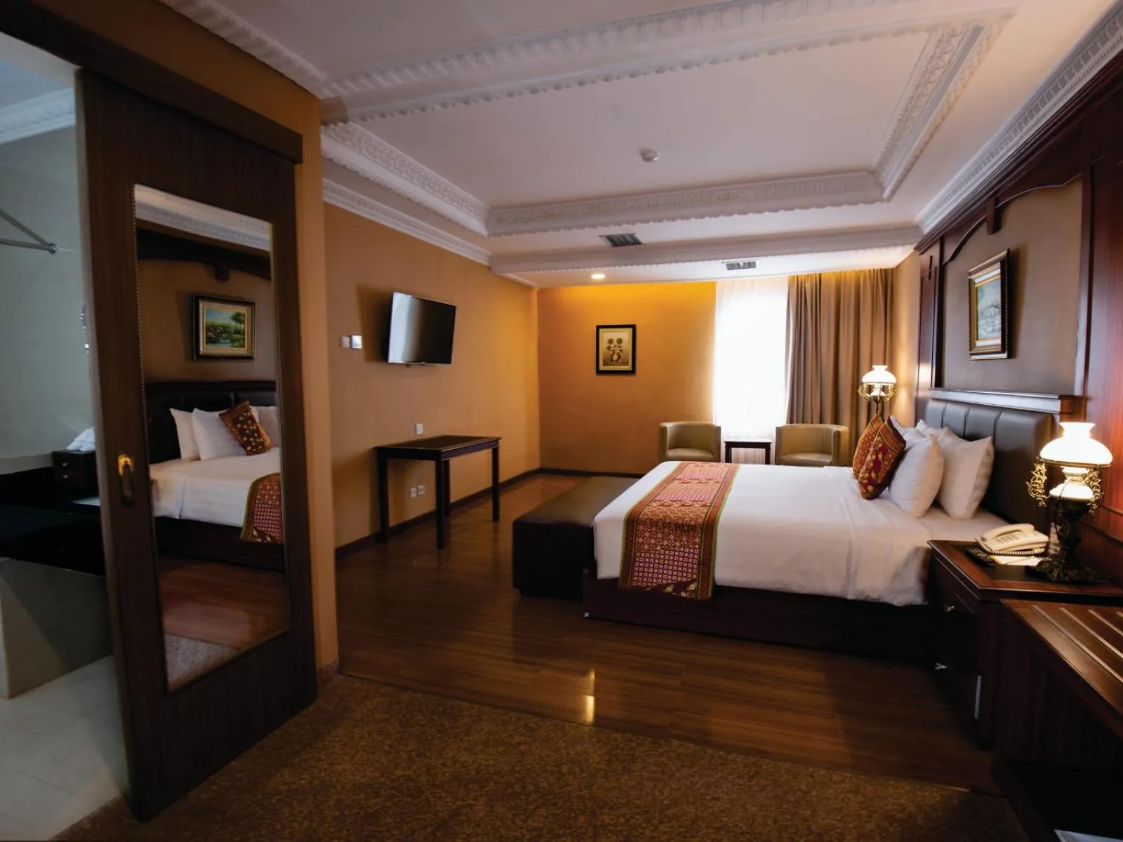 Bed in The Rich Jogja Hotel