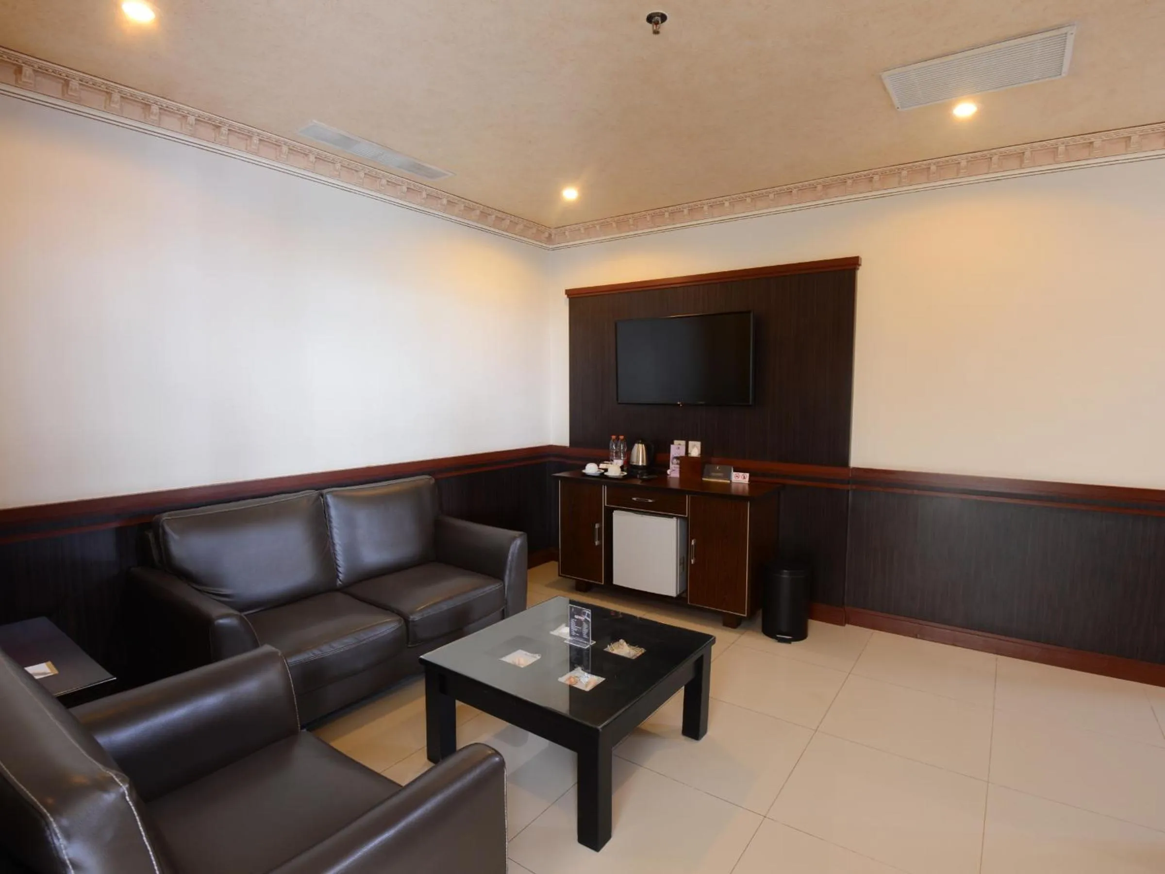 Living room in The Rich Jogja Hotel