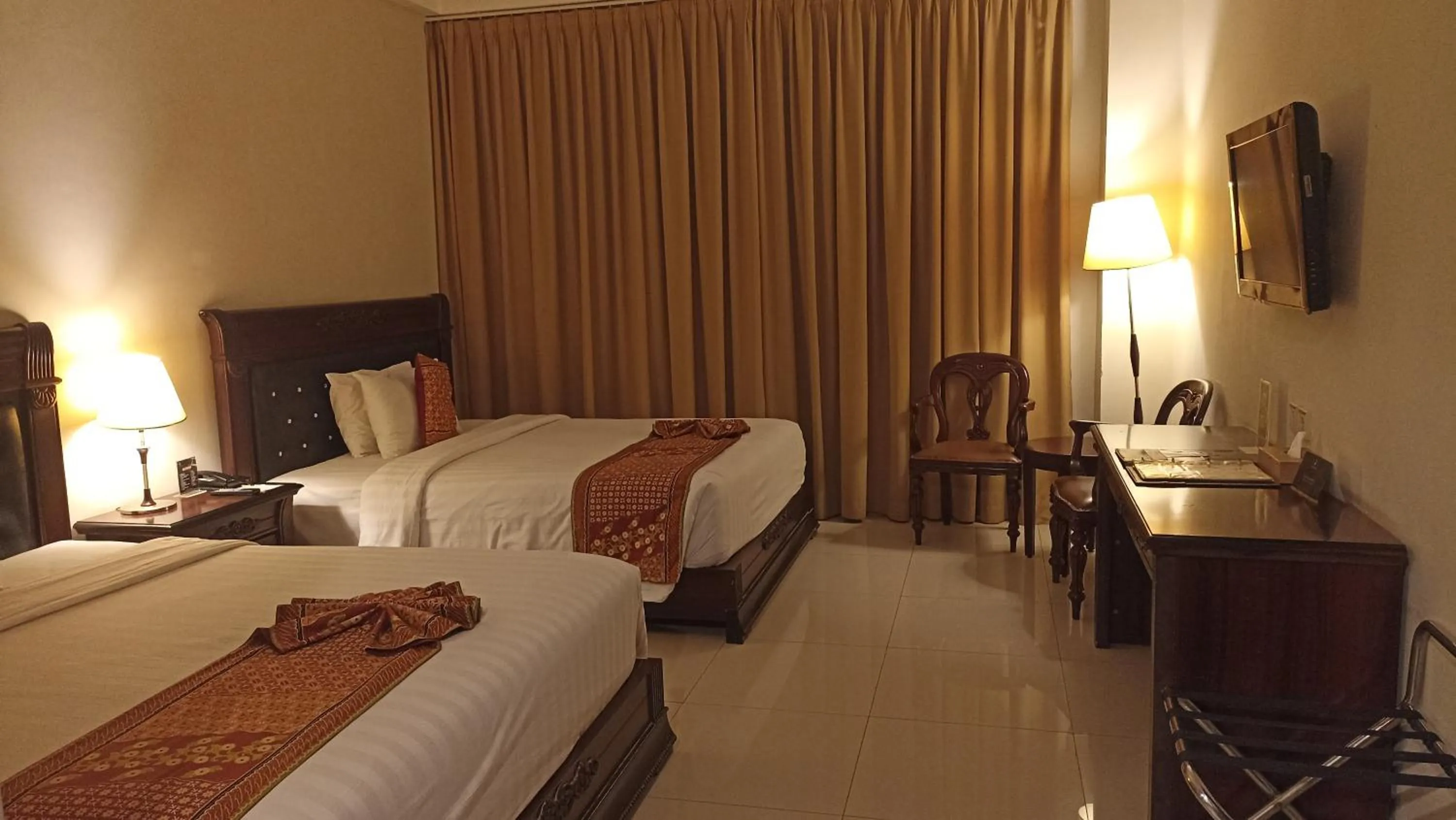 Bedroom, Bed in The Rich Jogja Hotel