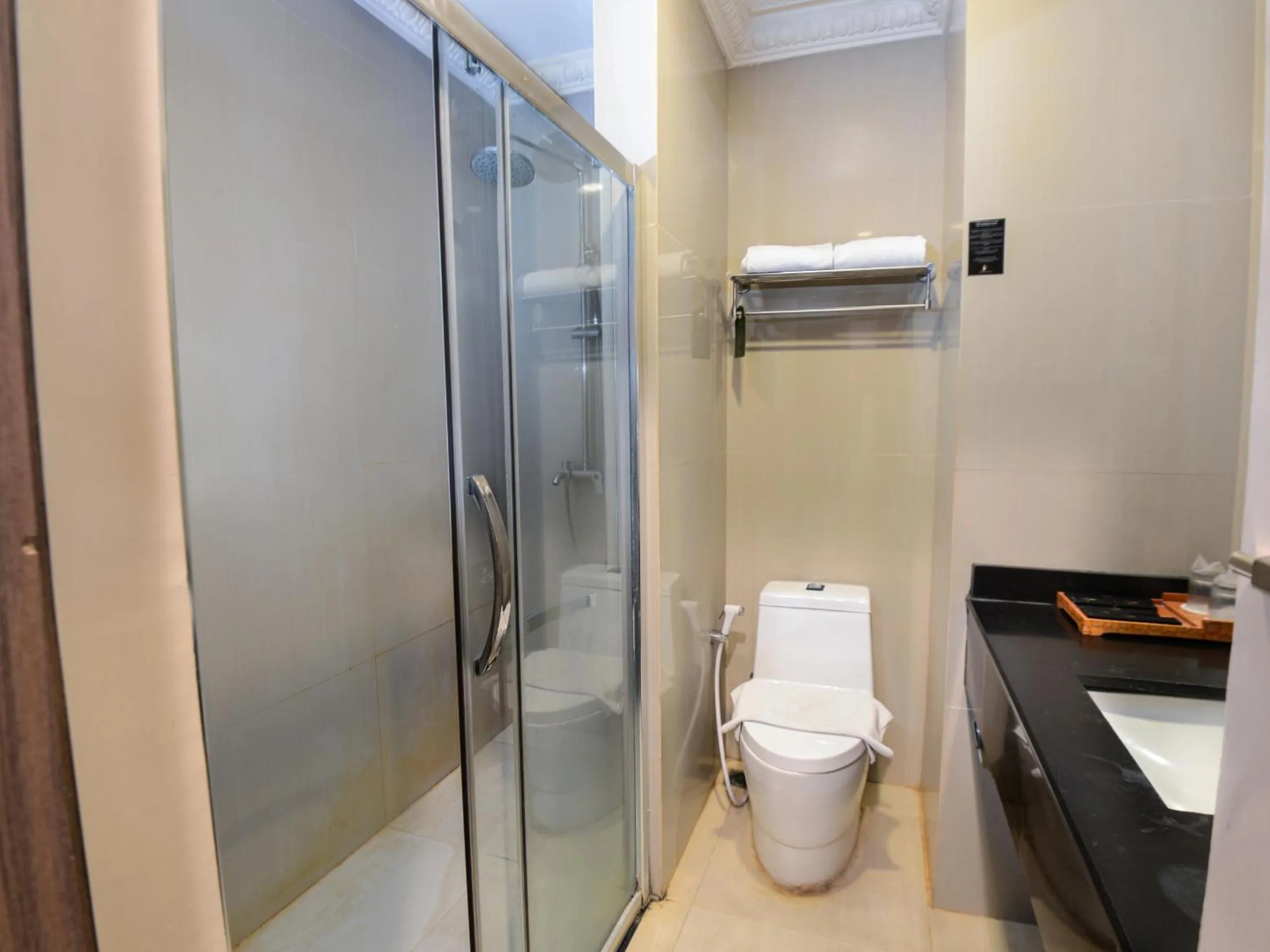 Bathroom in The Rich Jogja Hotel