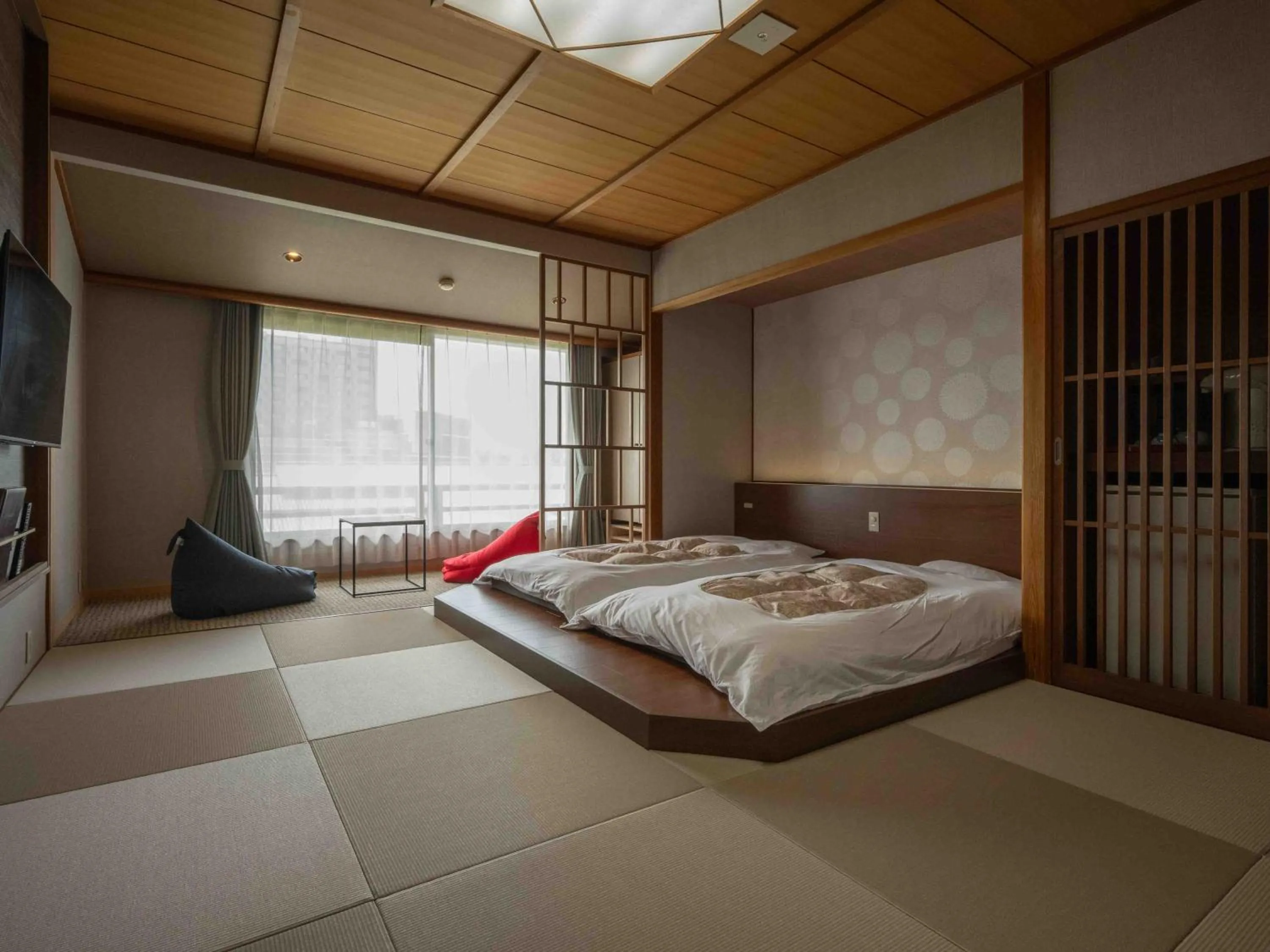 Bed in Awara Onsen Minoya Taiheikaku