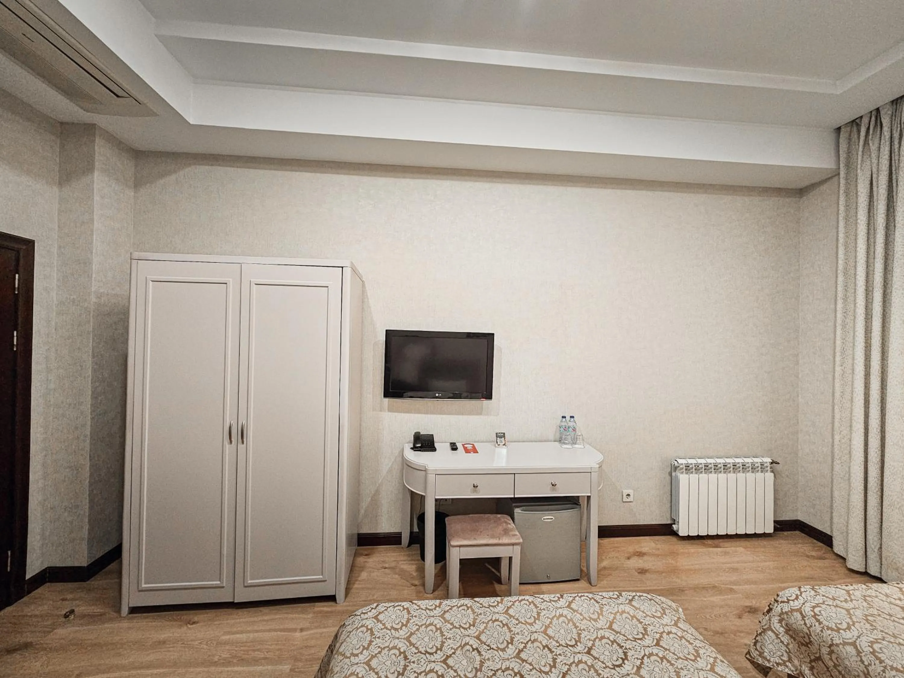 wardrobe, Bed in Safran Hotel