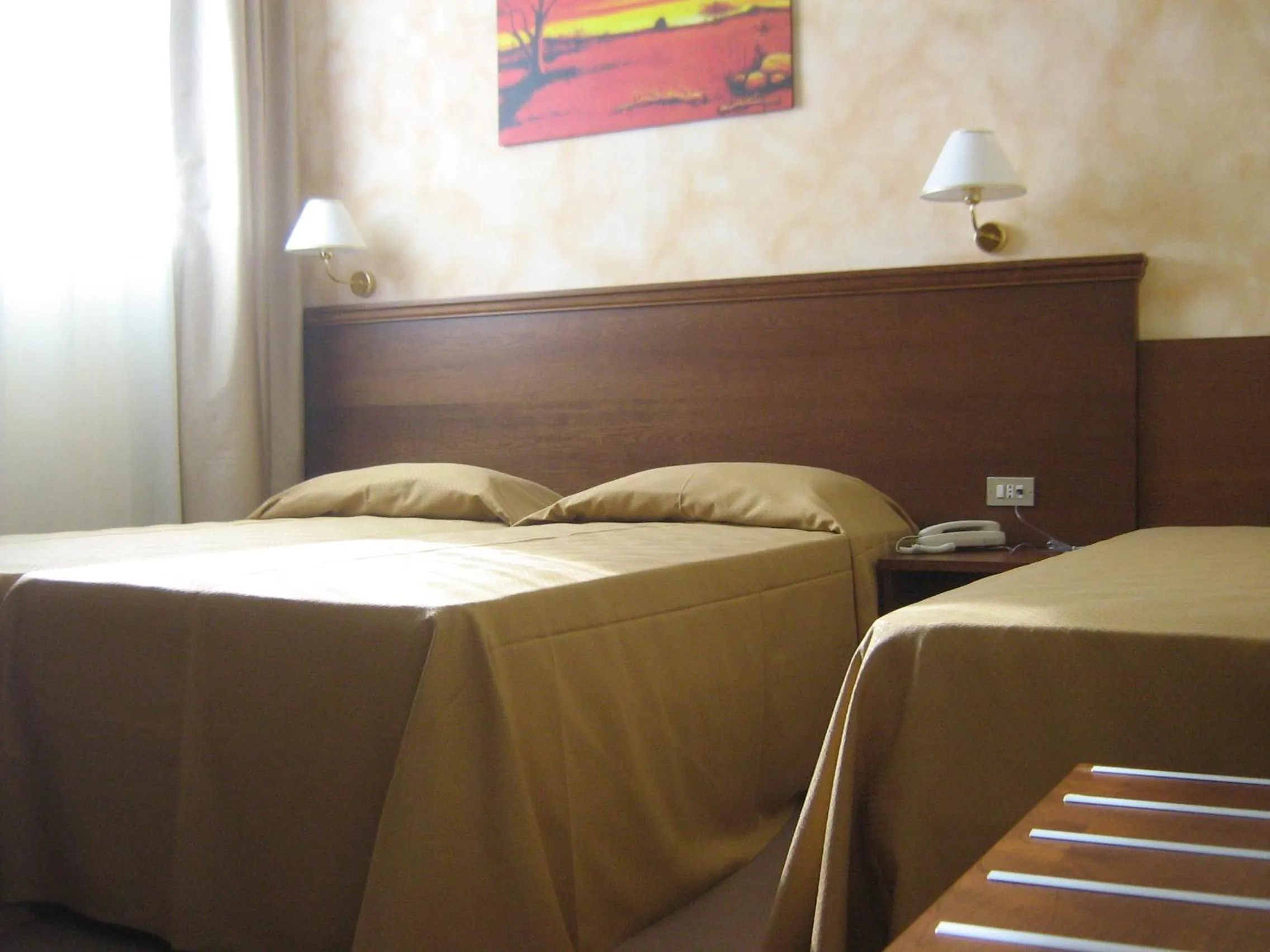 Bed in Hostiliae Ciminiera Hotel