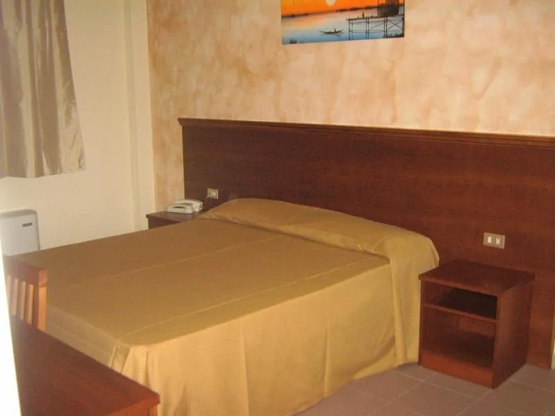Bed in Hostiliae Ciminiera Hotel