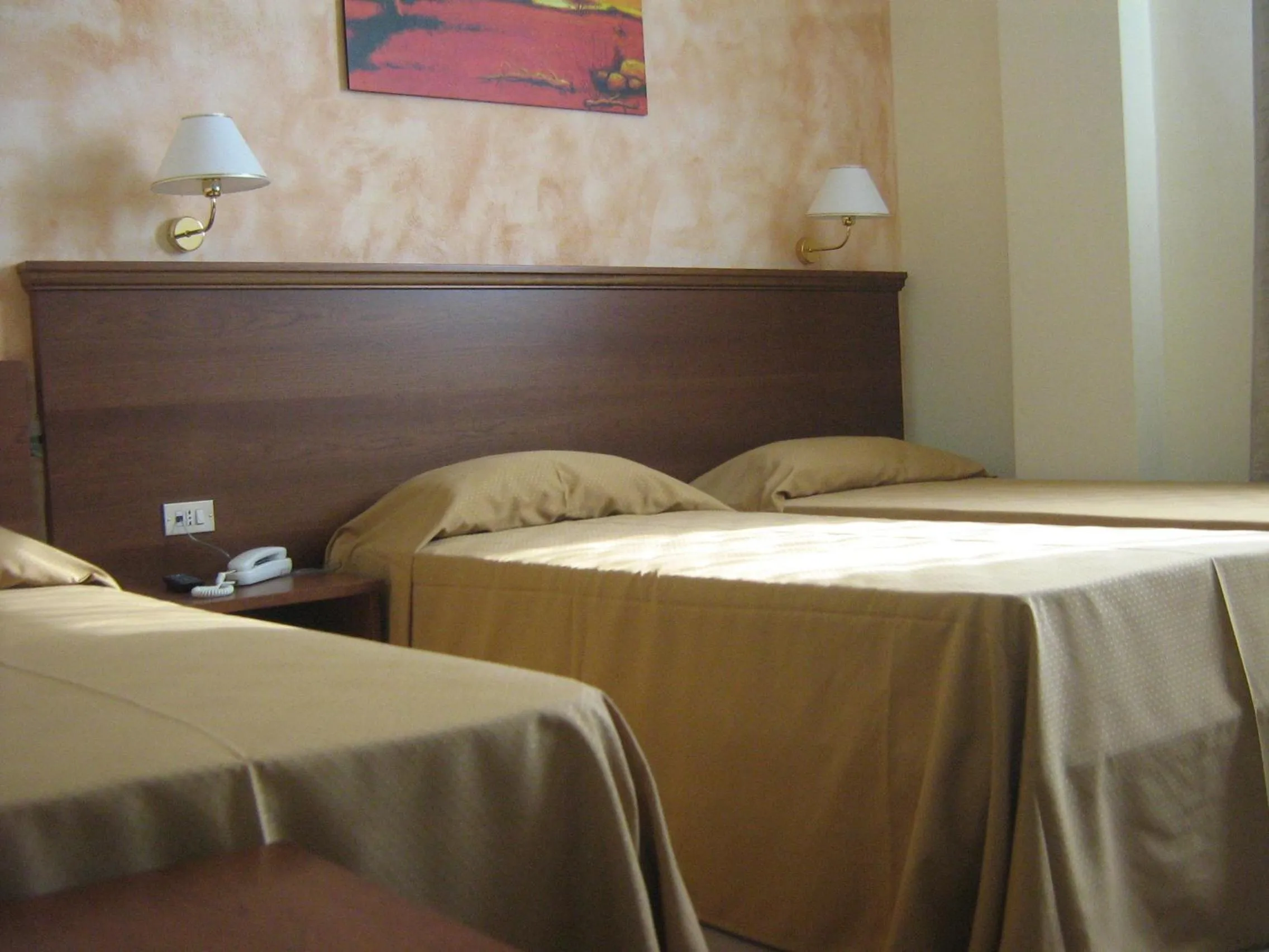 Bed in Hostiliae Ciminiera Hotel