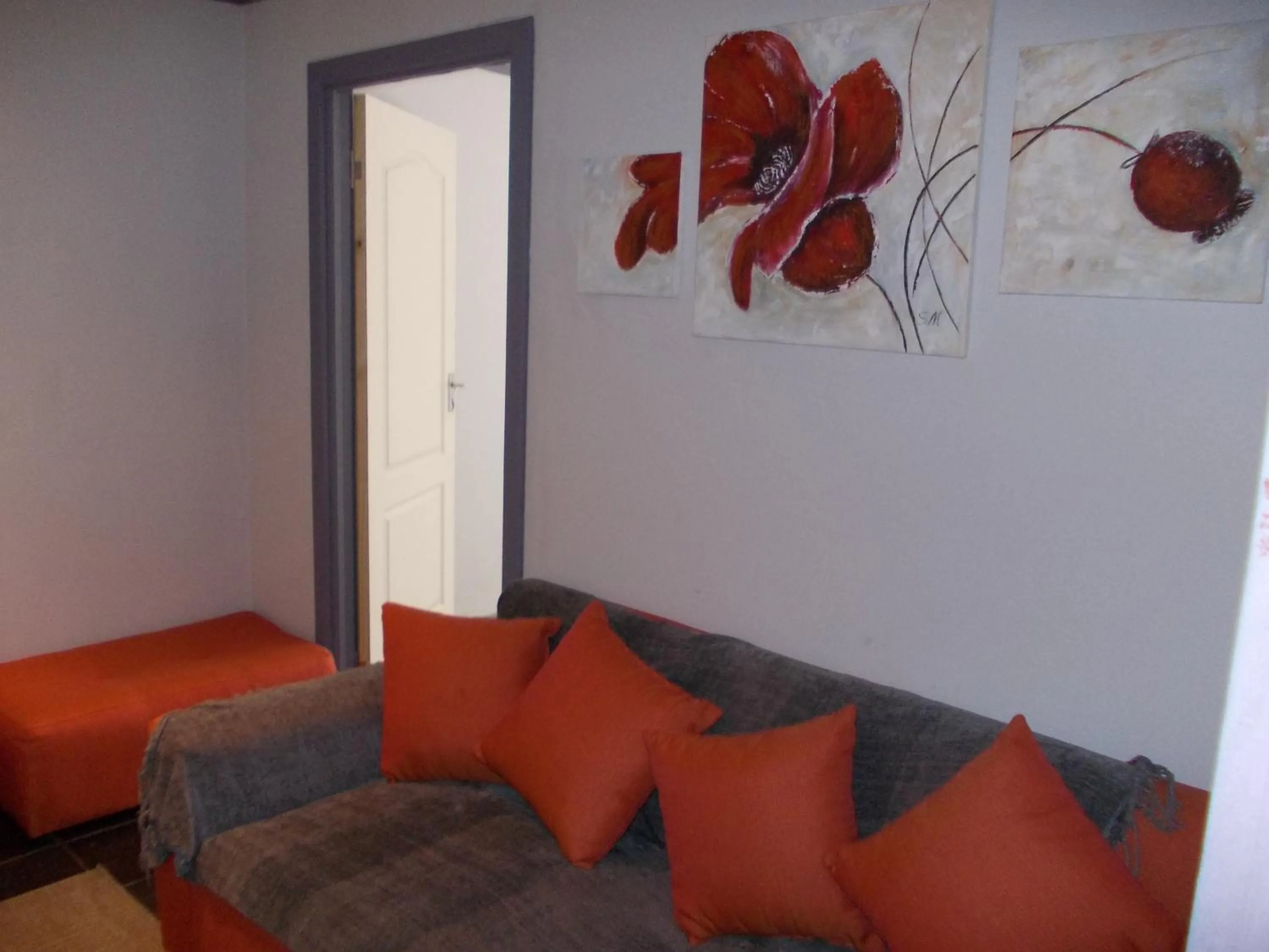 Living room in Homestay Travel Guest House