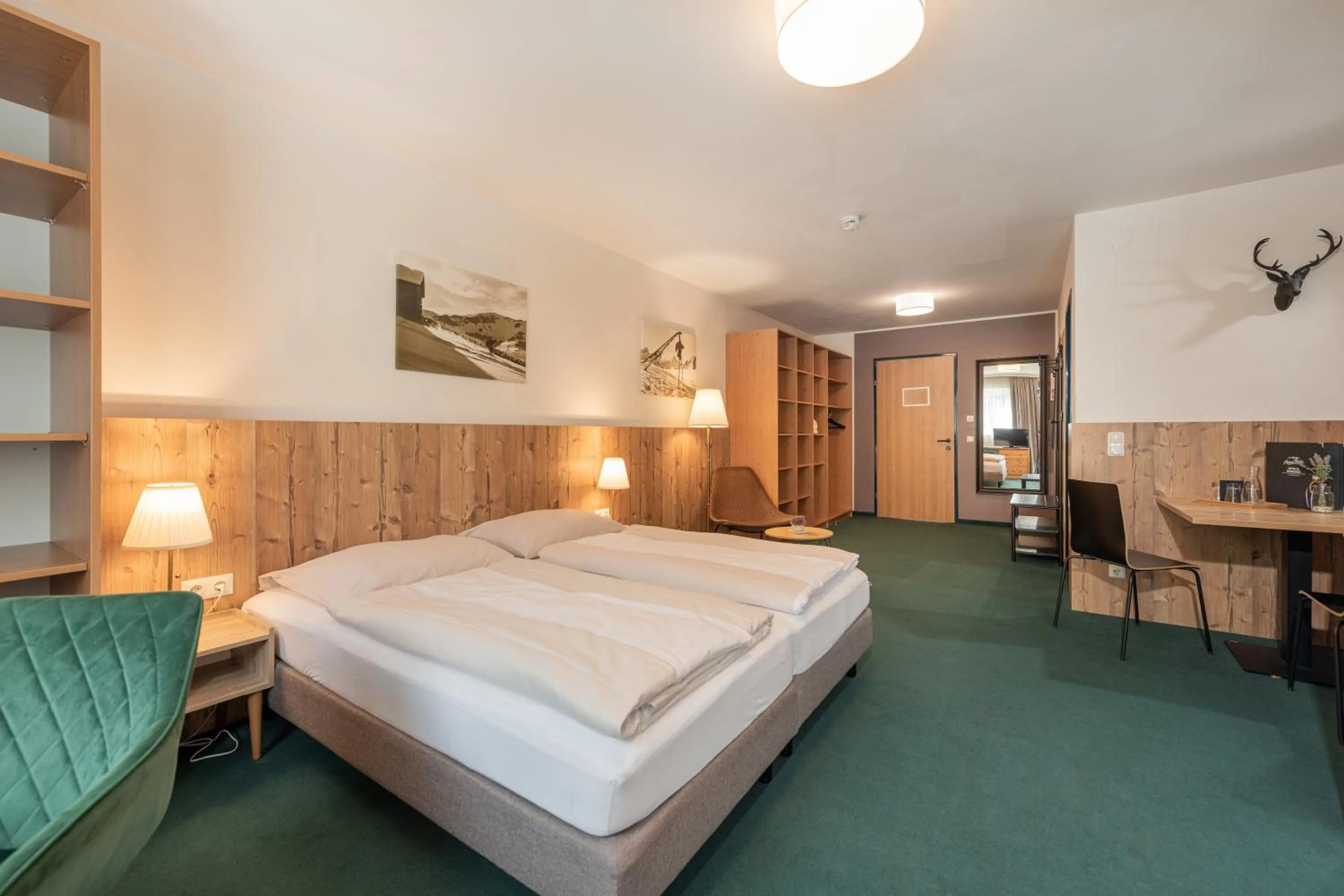 Bed in AlpenParks Hotel MONTANA