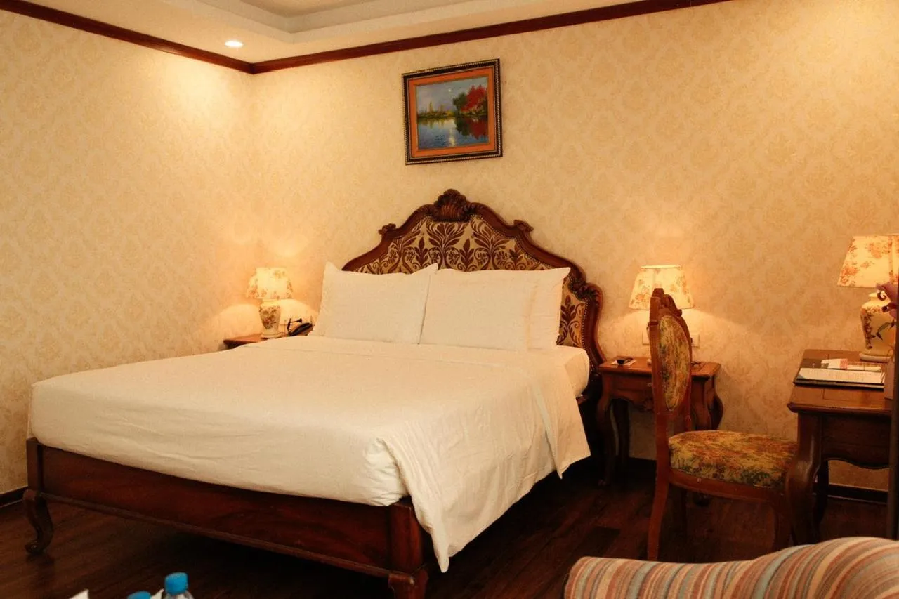 Bed in The Vissai Hotel